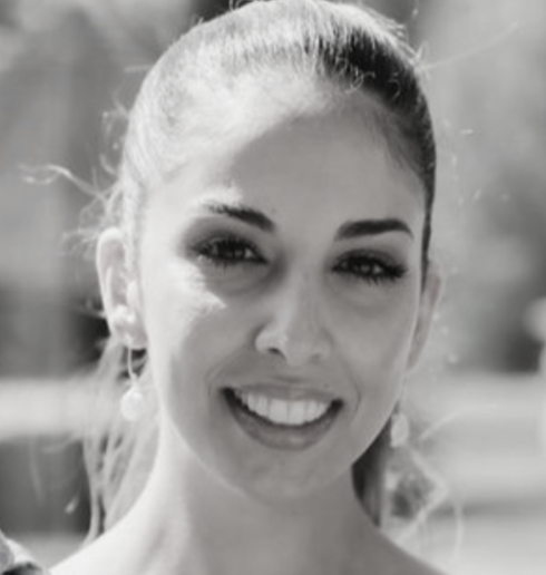 Emma Prinzi-Kemp, registered psychologist with a special focus on relationship anxiety for women. Grayscale image, headshot.