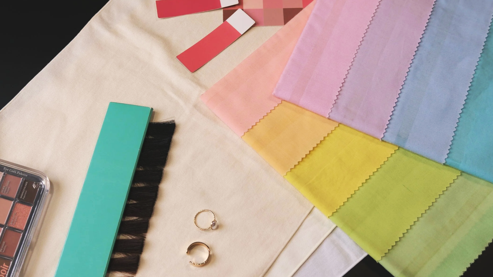 Colour drapes, hair swatches and makeup materials at code.d