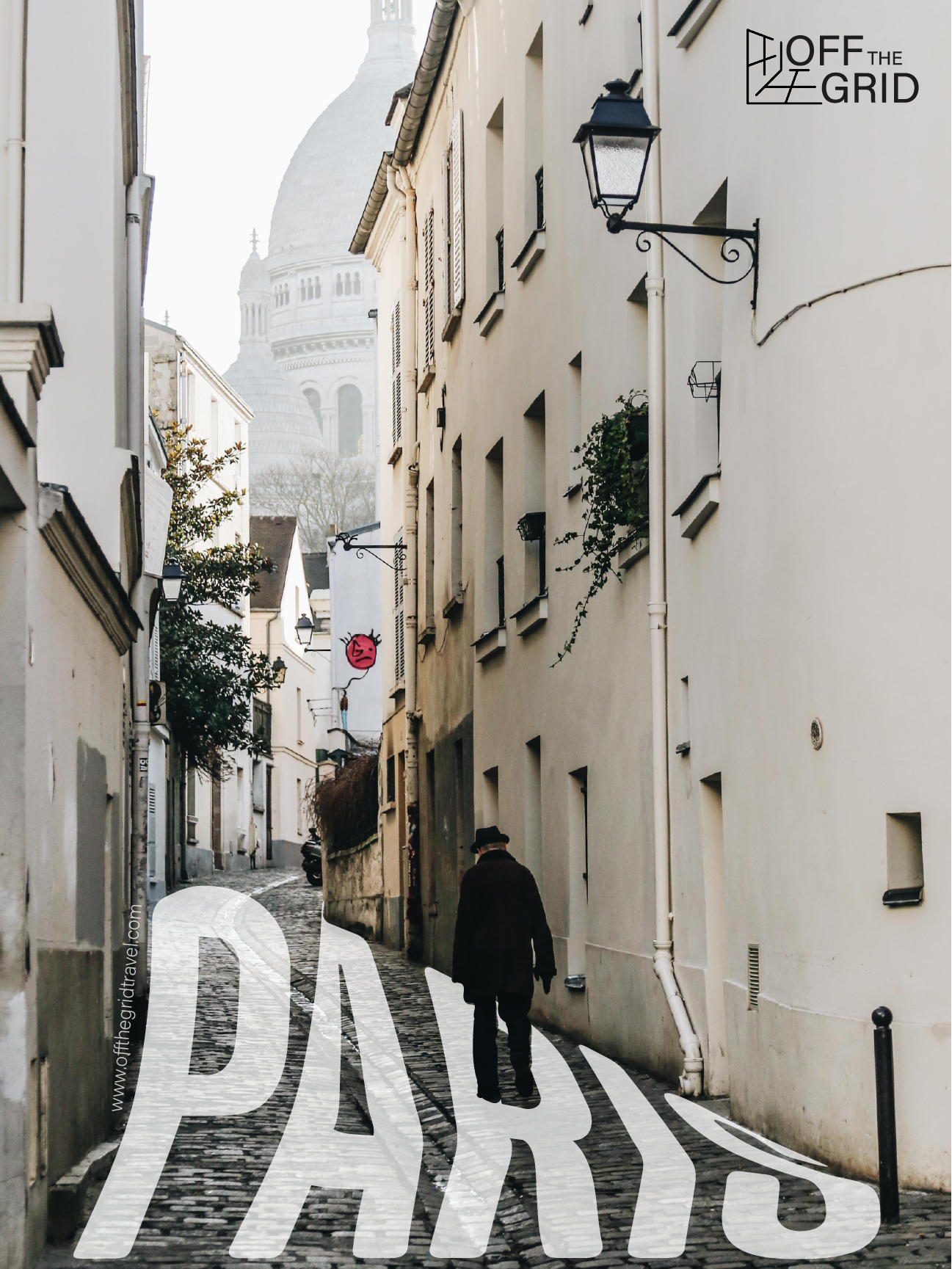 A cobblestone street in Paris with tall cream-colored buildings, black street lamps, and a person walking away wearing a coat and hat, with the Eiffel Tower in the background and 'PARS' written on the street in large white text.