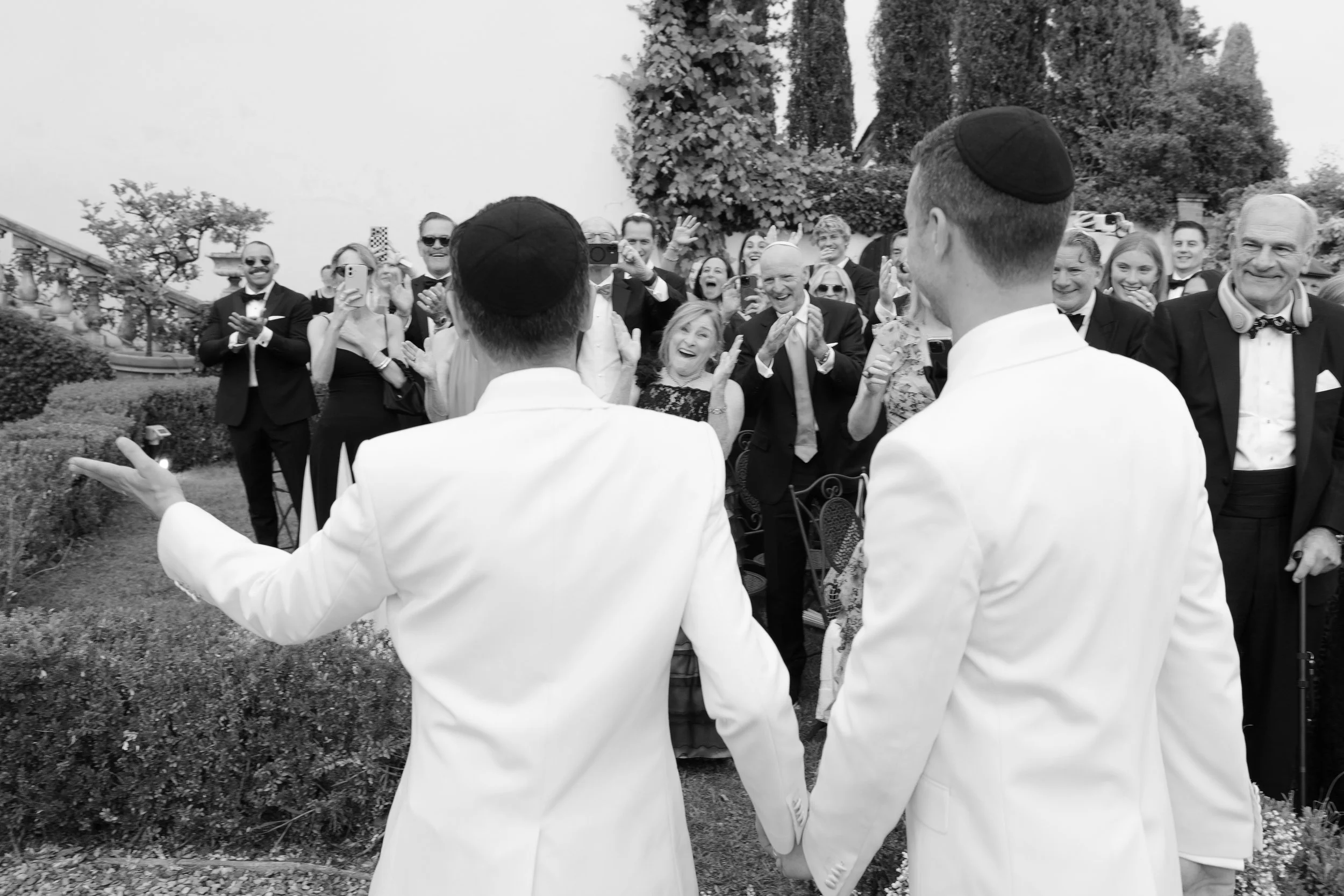 Guests celebrating the newlyweds after the ceremony