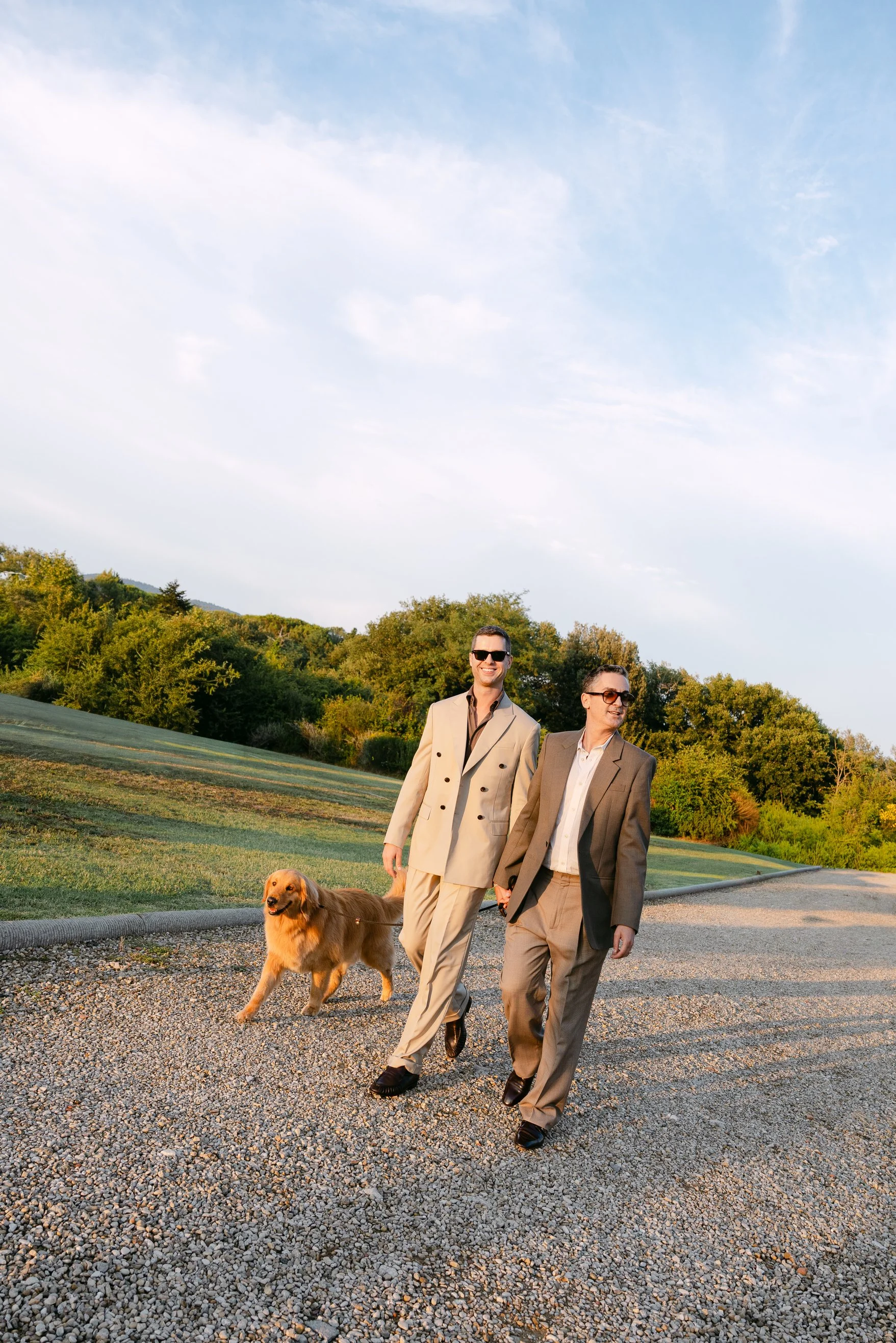 Micah and Stefan walking through the Tuscan countryside at Il Borro