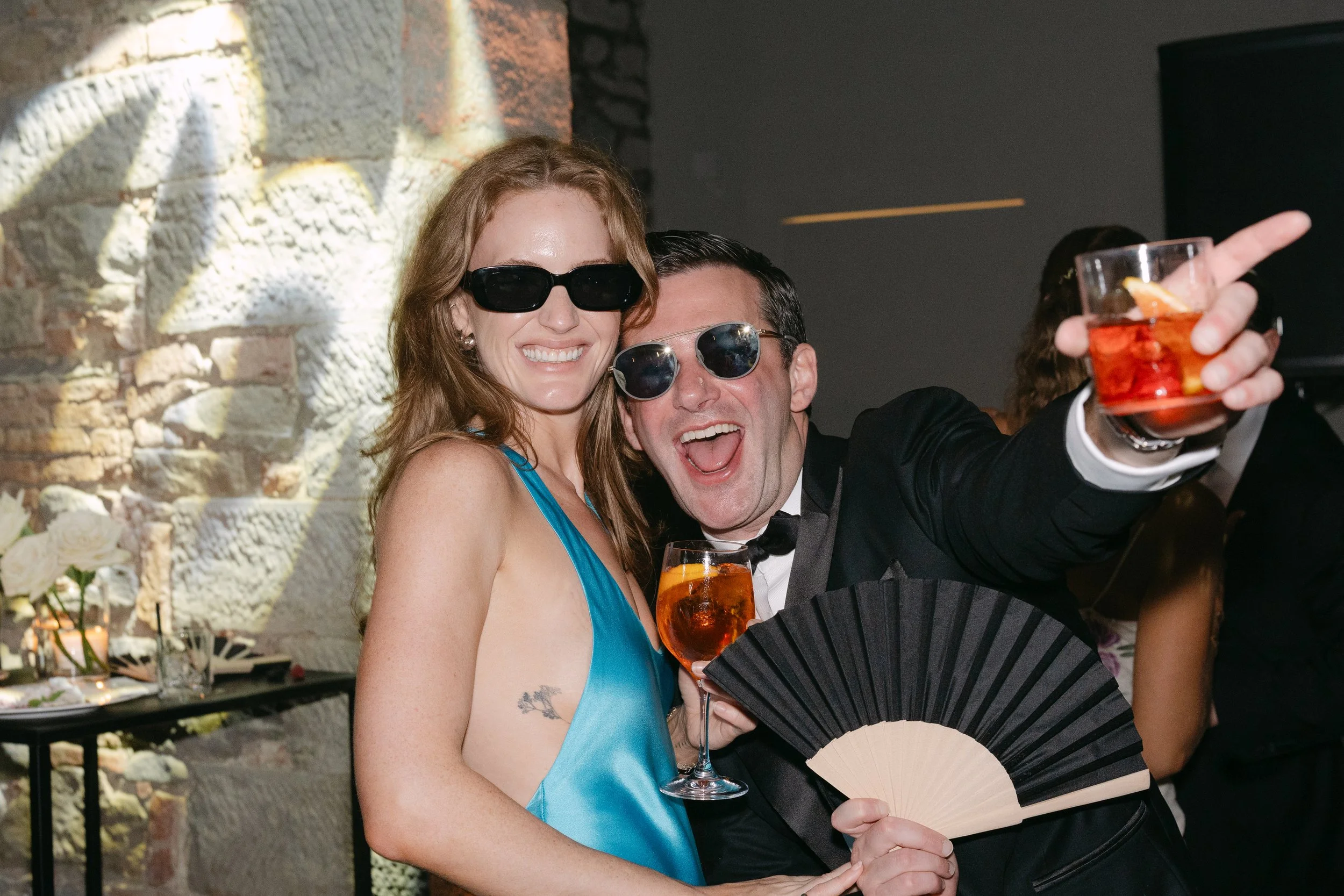 Guests celebrating at the wedding reception in Tuscany