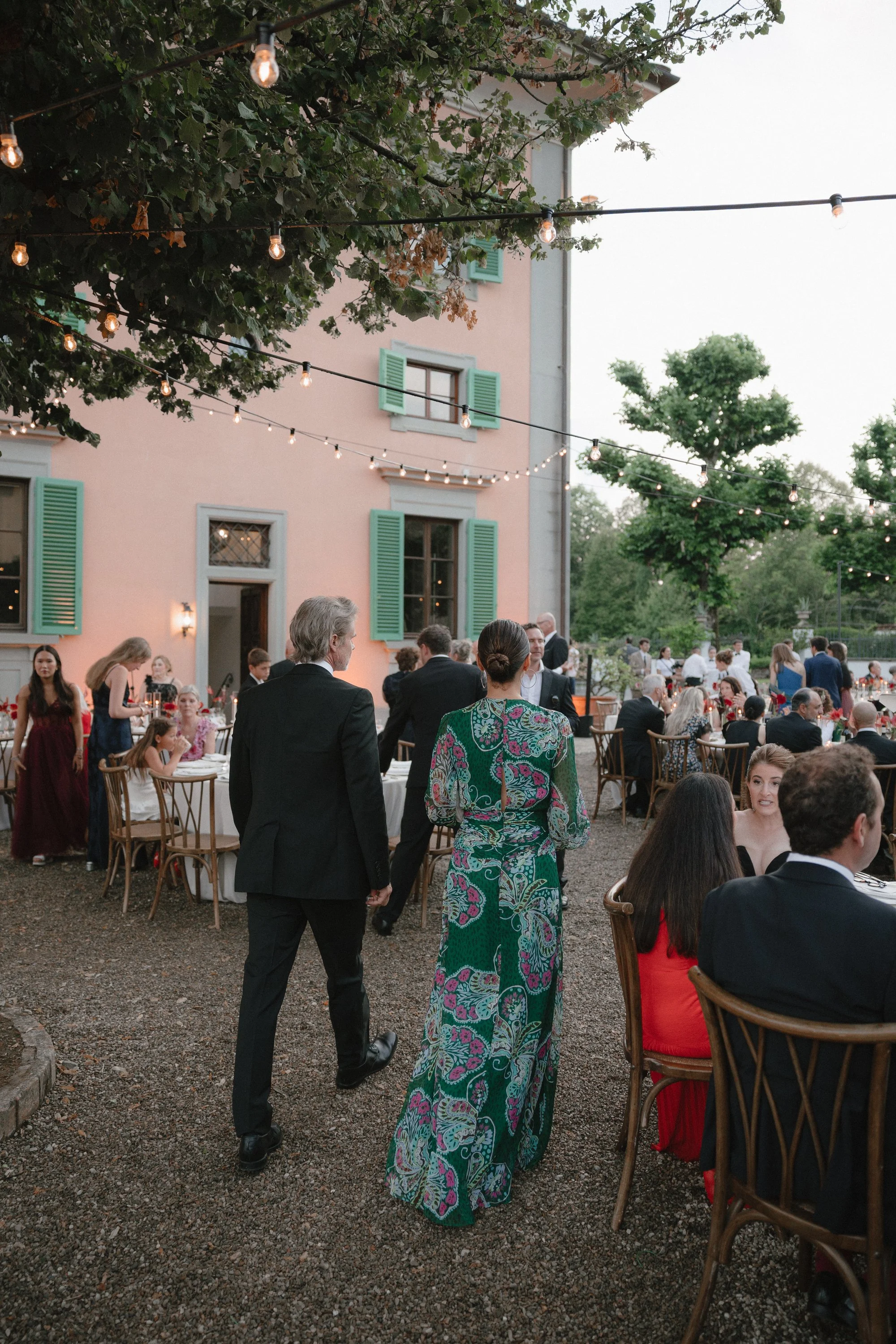 Guests enjoying the reception in the courtyard of Il Borro