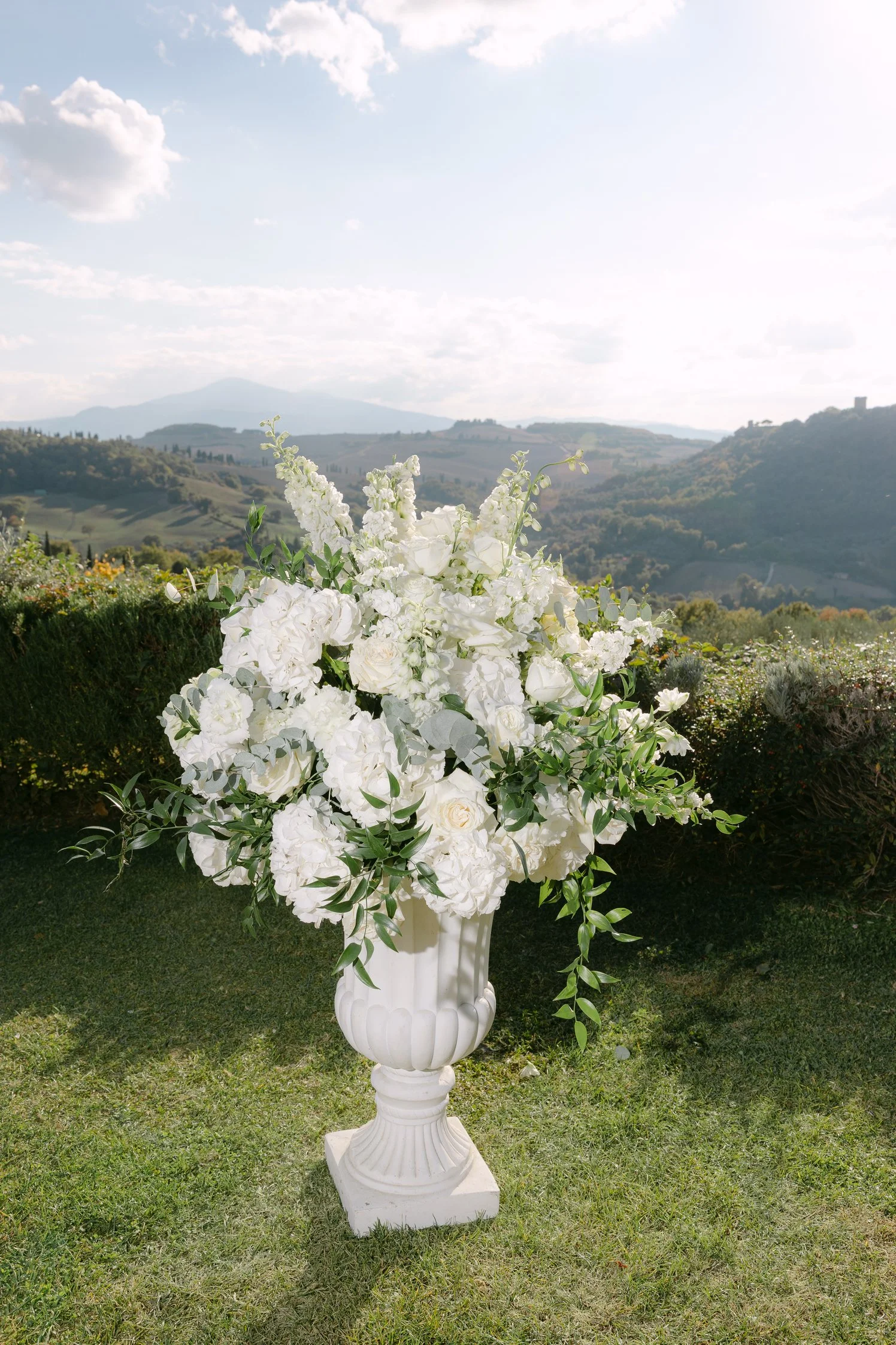 Flower arrangement for ceremony - all white and green florals
