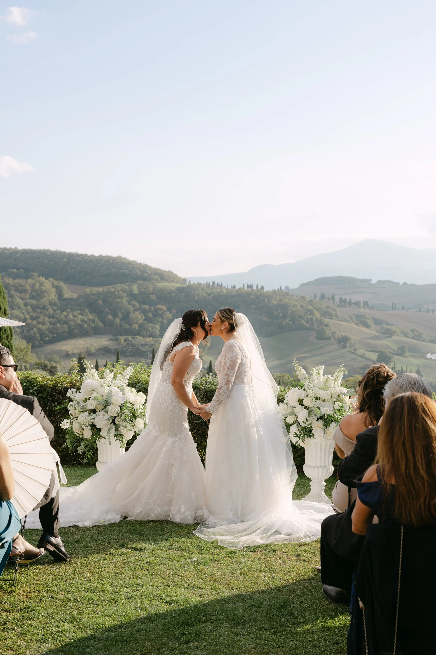 First kiss as bride and bride. Same Sex wedding in Tuscany, Italy