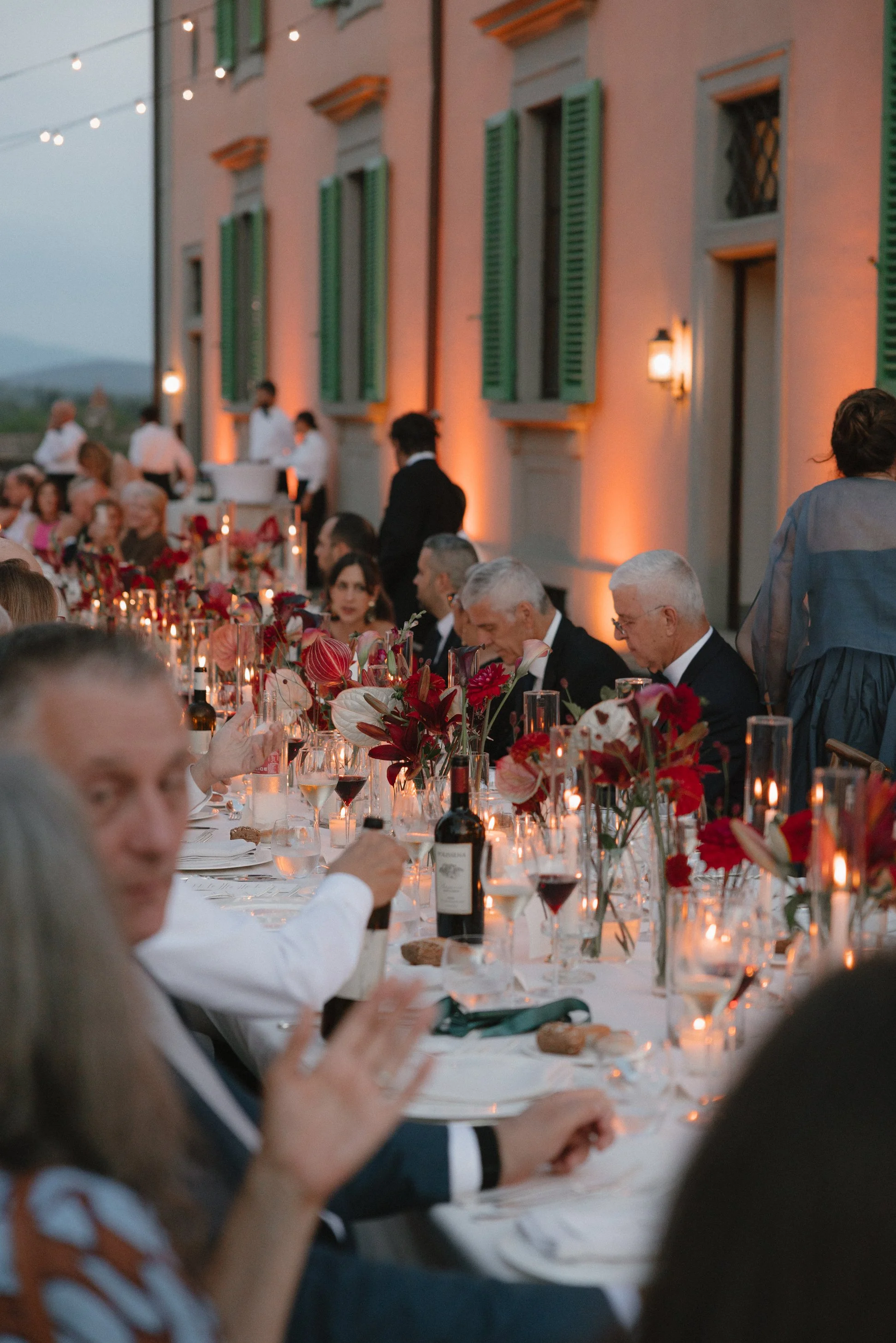 Guests enjoying dinner in the courtyard at Il Borro