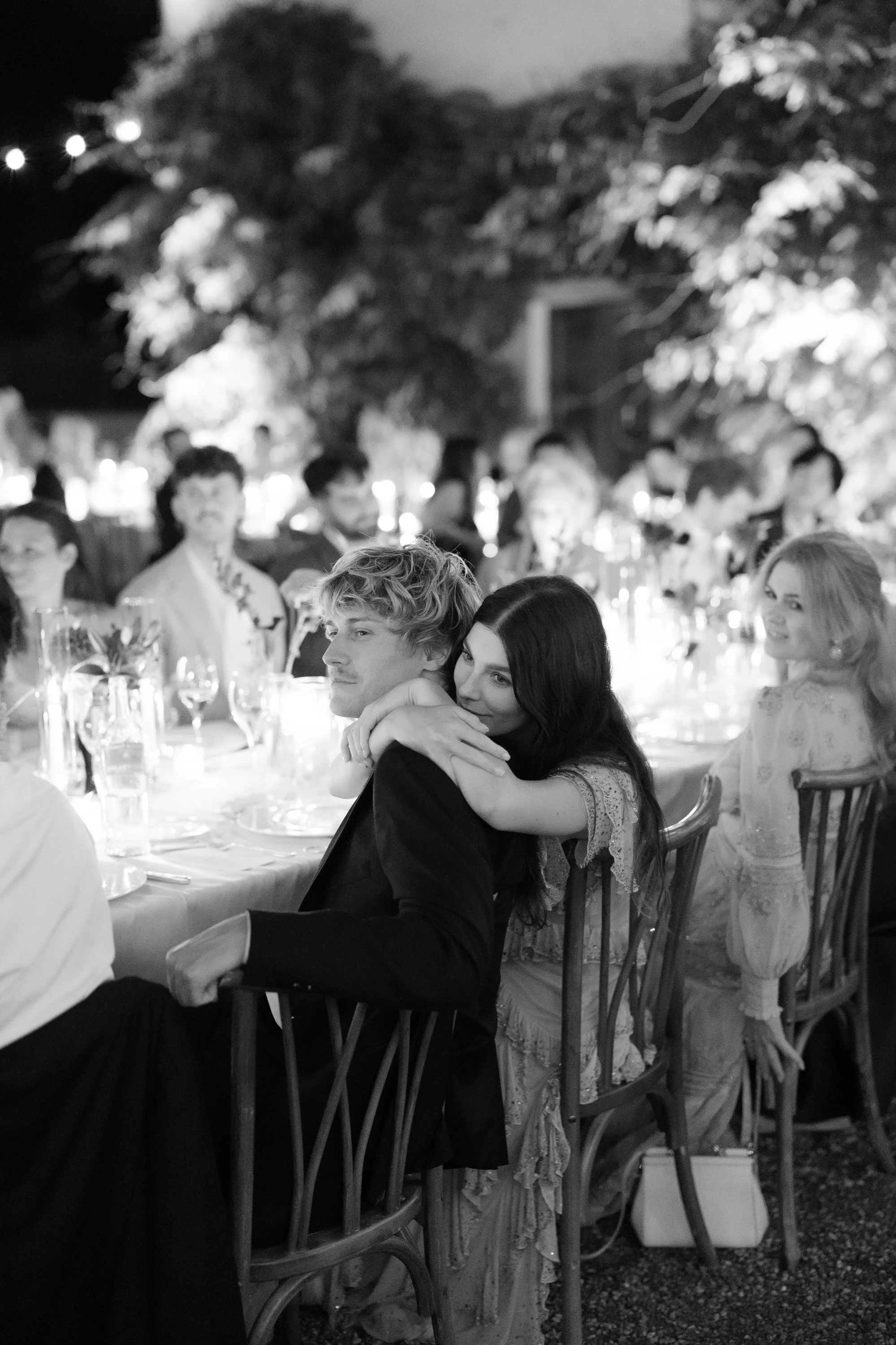 Emotional moments during dinner beneath candlelight - Camila Morrone and Cole Bennett 