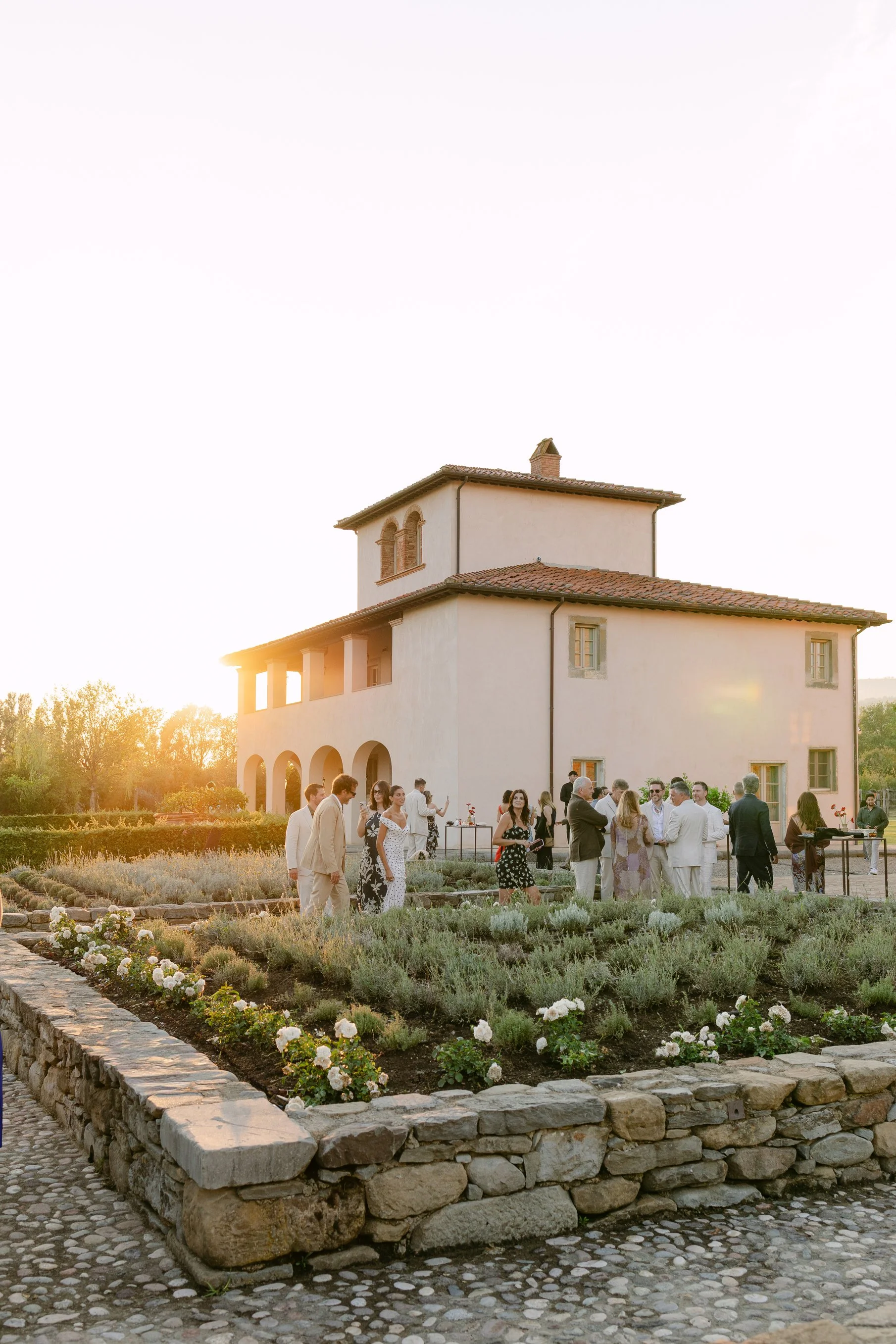Guests gathering outside Aia del Borro before the welcome dinner