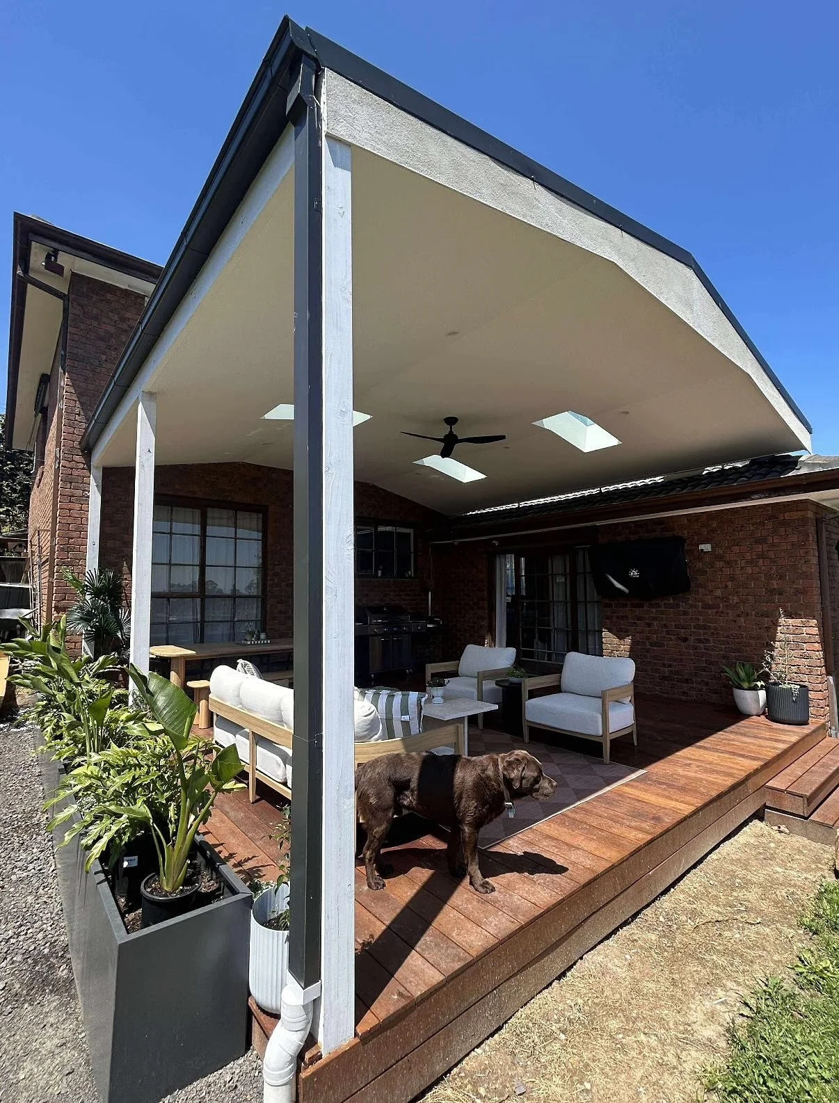 Our latest pergola build, featuring a timber deck, skylights, and seamless integration with the homes brickwork. 

We turned this patch of grass into an ideal space for year-round entertaining.. this family member approves 🐶 

#deck #pergola #outdoo