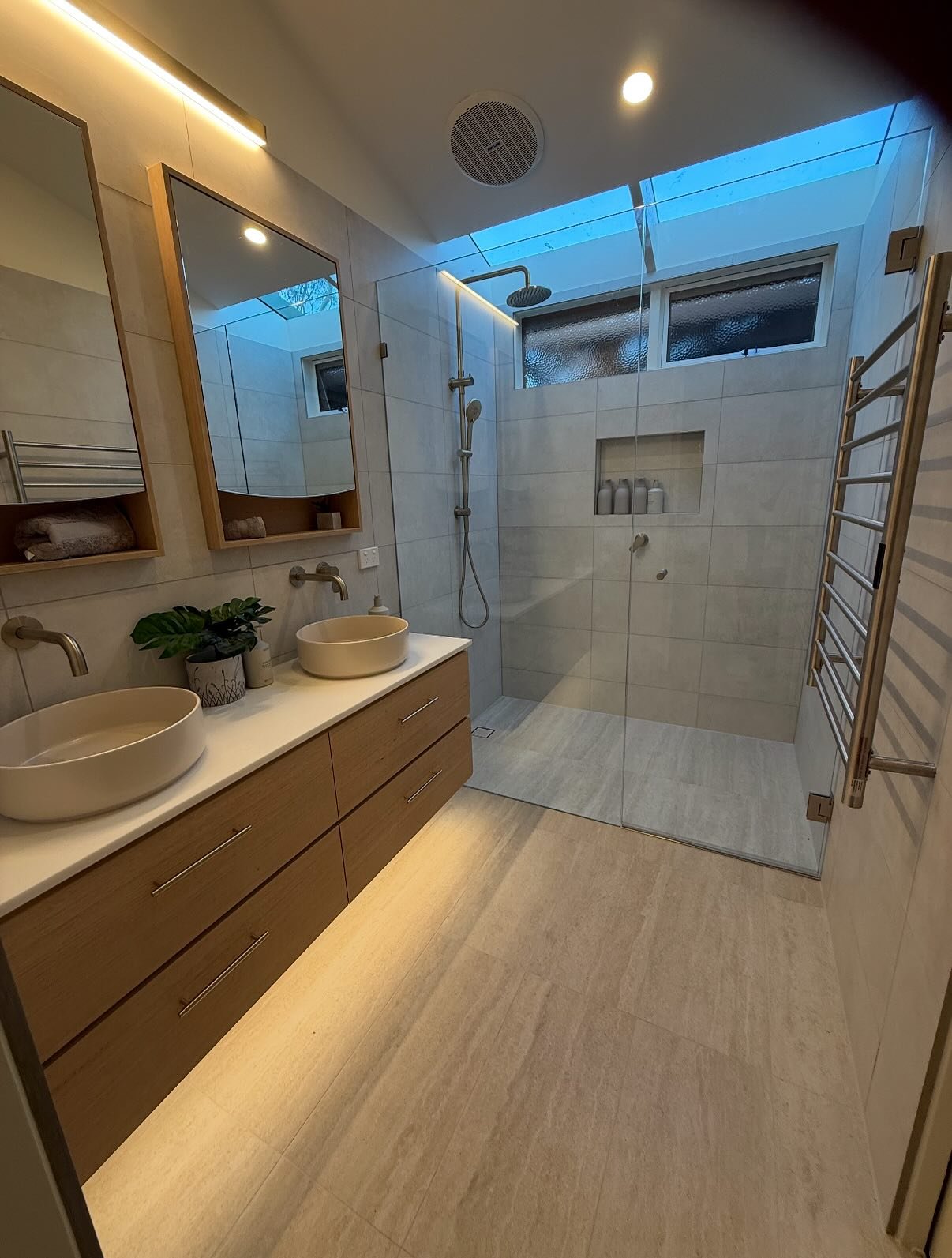 Would you believe this is the same space? 😍

We replaced the old shower and vanity with a spacious walk-in design, custom oak cabinetry, and soft ambient lighting to create a spa like retreat right at home.

#BathroomRenovation #morningtonpeninsula 