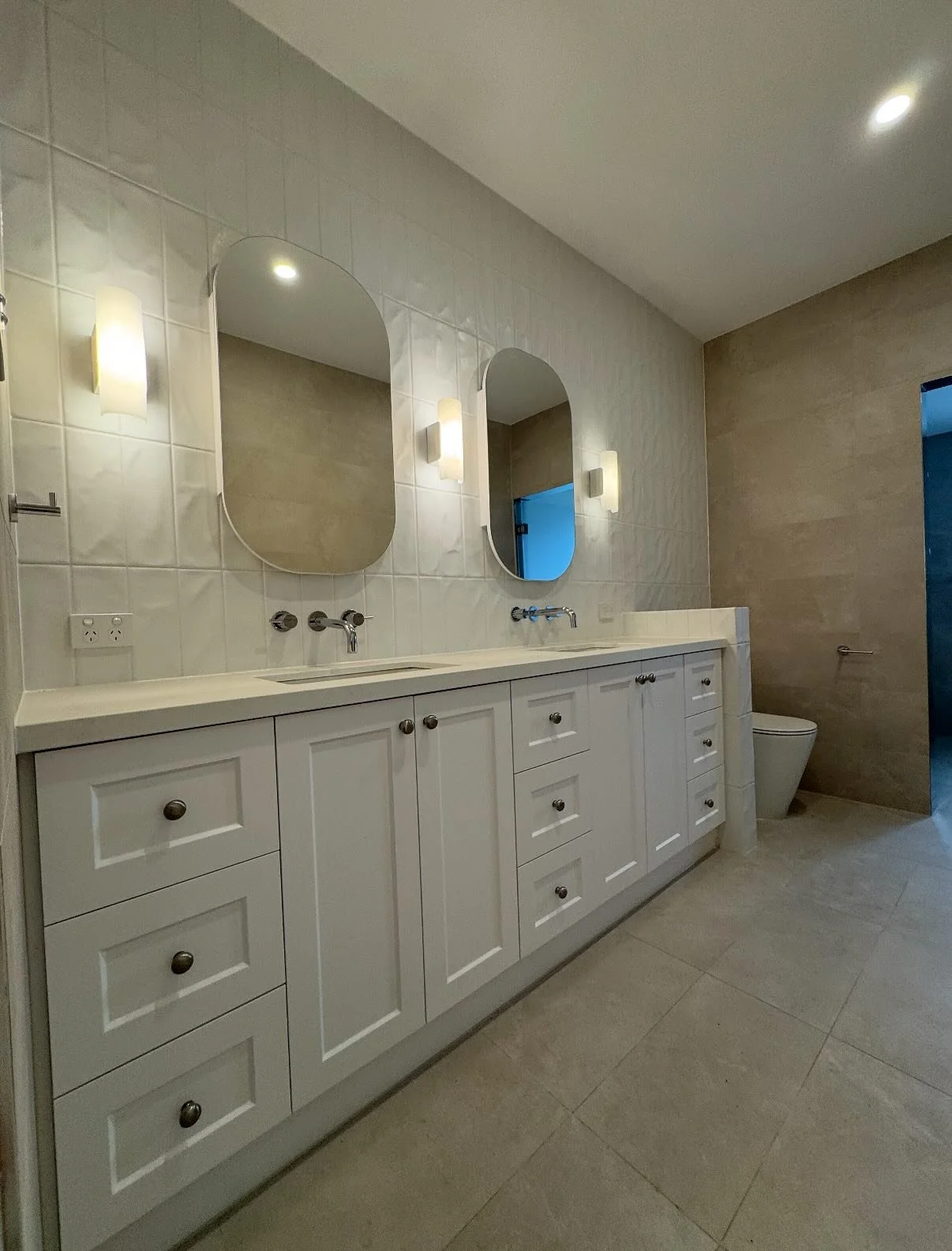 This beautiful bathroom transformation is part of our recent Somerville project.

We refreshed every surface, removed the bulky spa and opened up the layout to create a calm and modern space this home truly deserved.