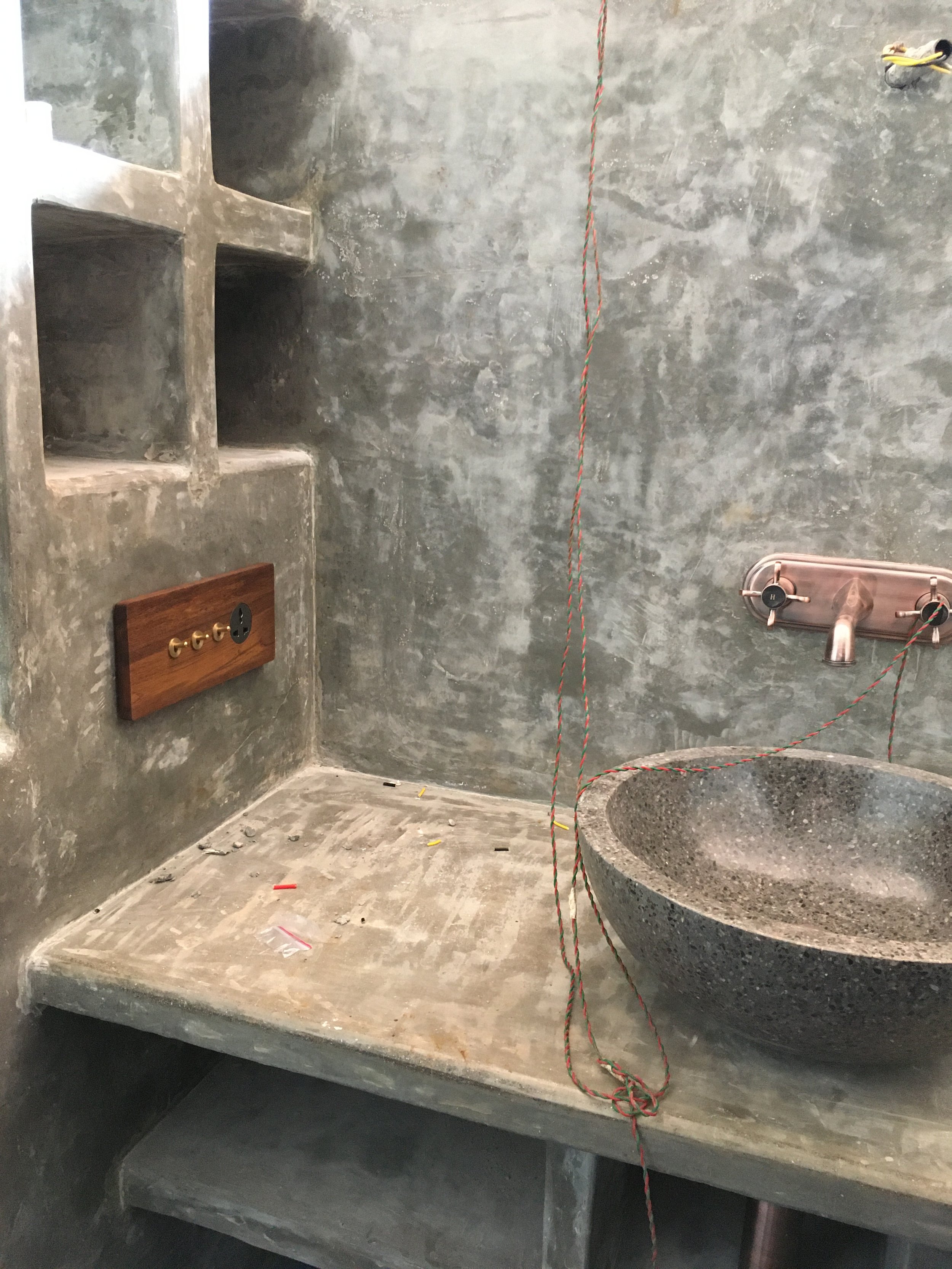 Concrete bathroom counter with bowl sink