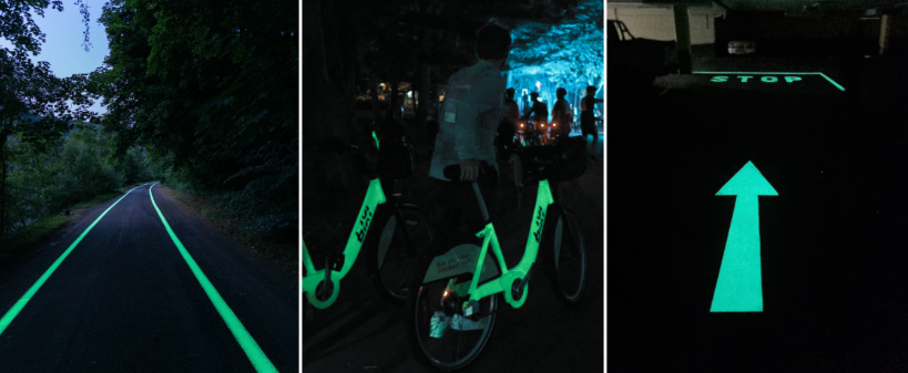 Three images: first shows a dimly lit road with glow-in-the-dark lines on the sides, surrounded by trees; second depicts a person holding a glowing bike with people in the background at night; third displays a glow-in-the-dark sign with an arrow pointing forward and the word 'STOP'.