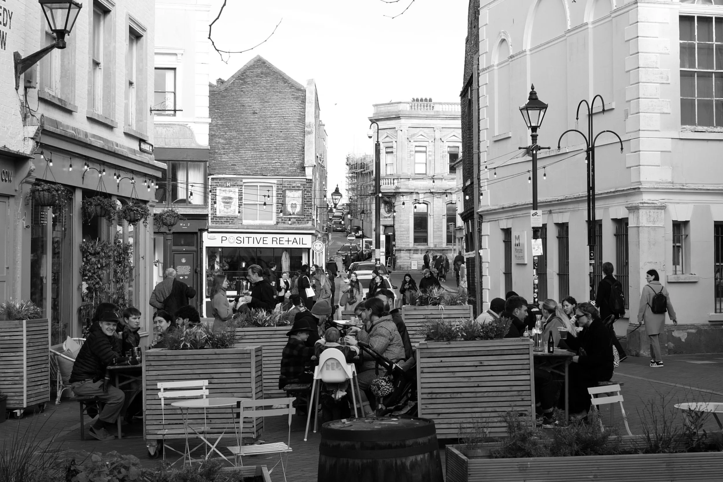 A busy scene of chatters mumble, a smile, a look, a child. 