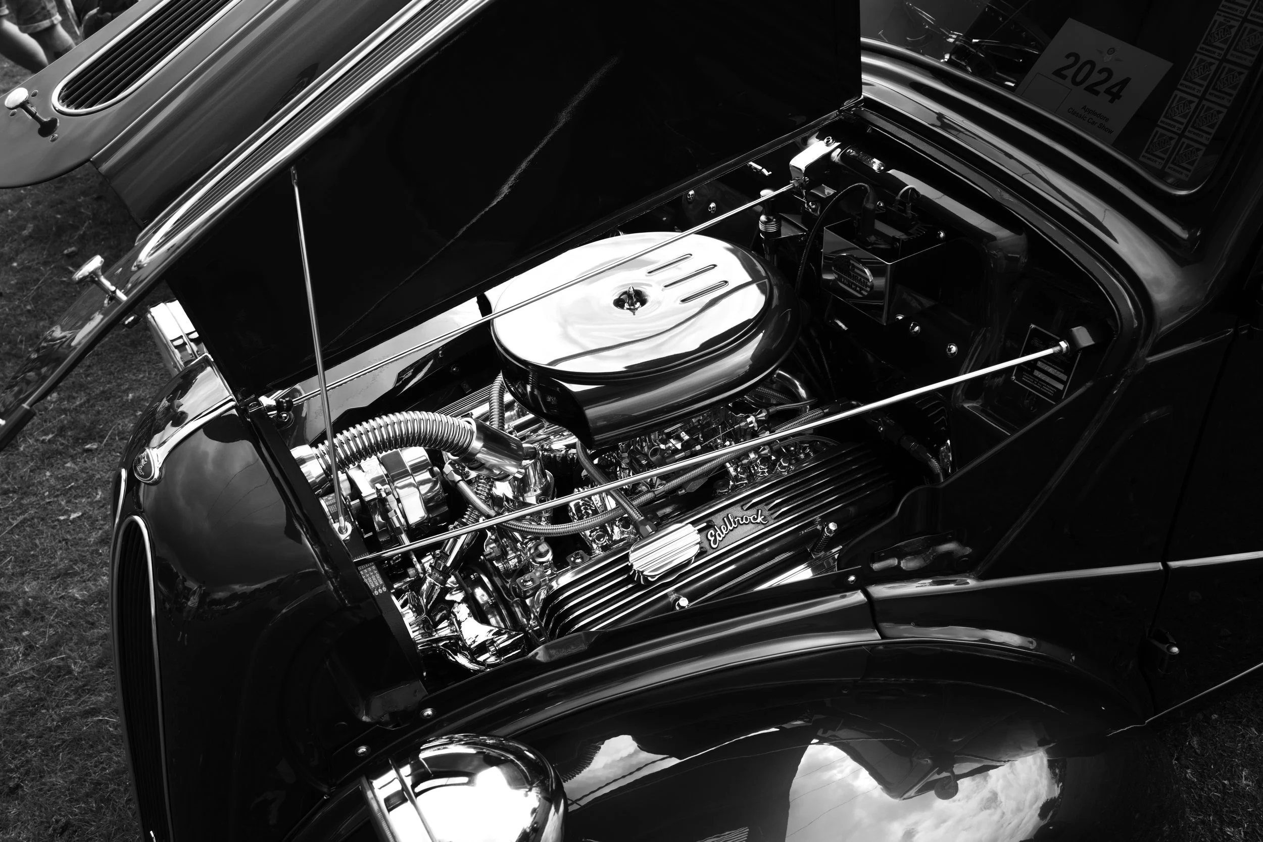 The engine hums in chrome and sweat. It runs on love and passions will. The life they lead,  through time a journey travelled. 