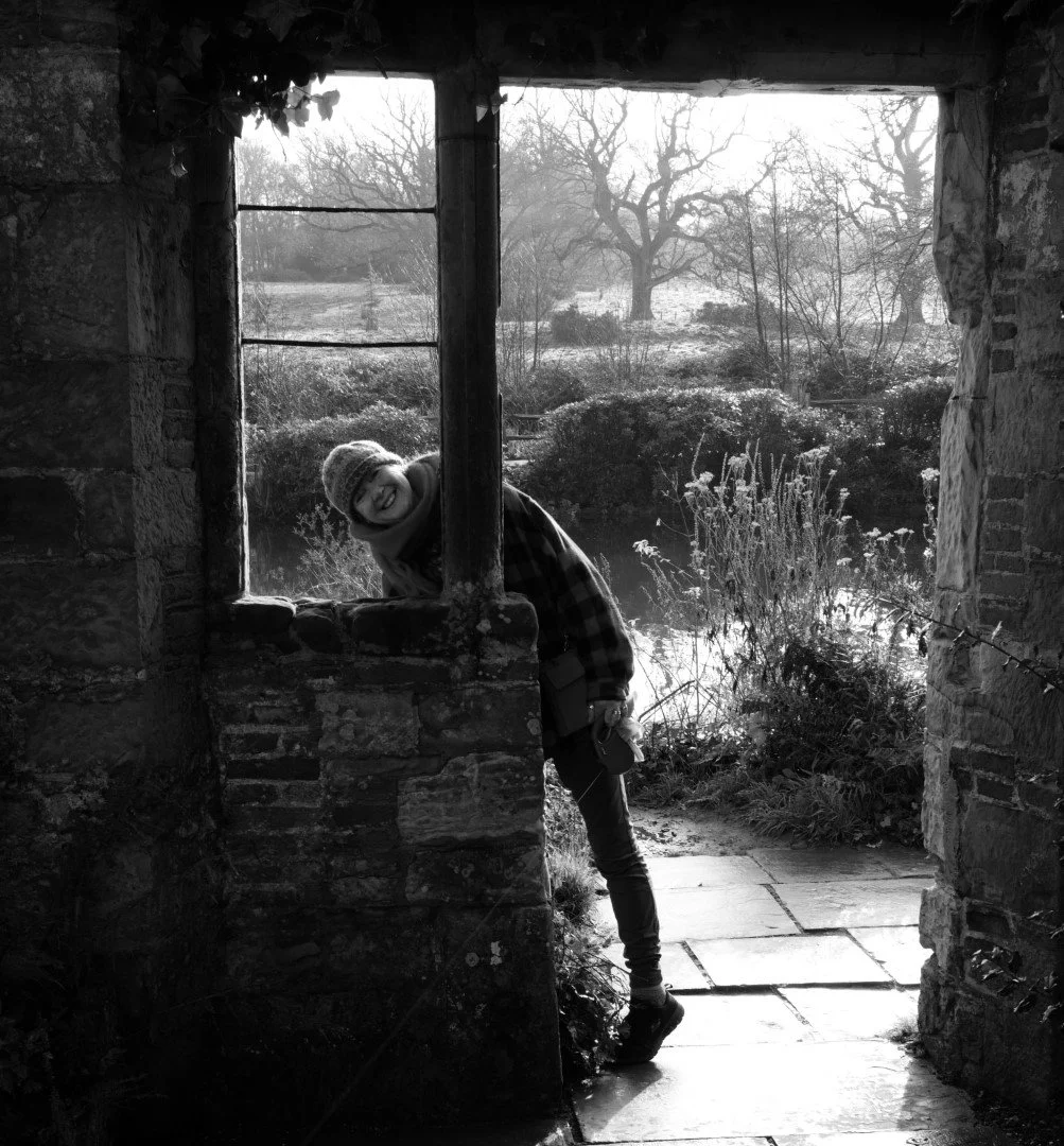 A smile, a glint, a mind held in loves sweet arms. The time to walk amongst the stone is precious to those that know.