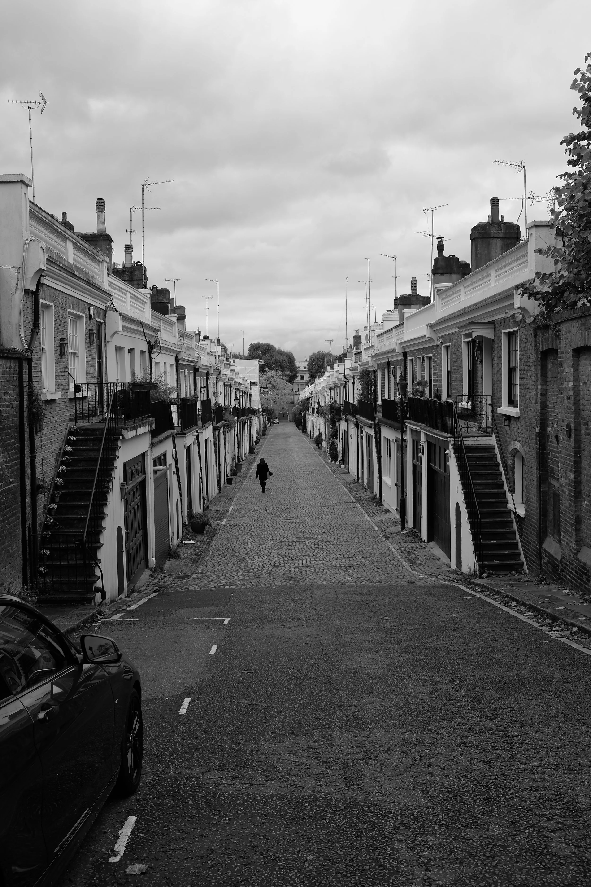 A London Mews, time is held and quiet is the gentle tap of echos walk