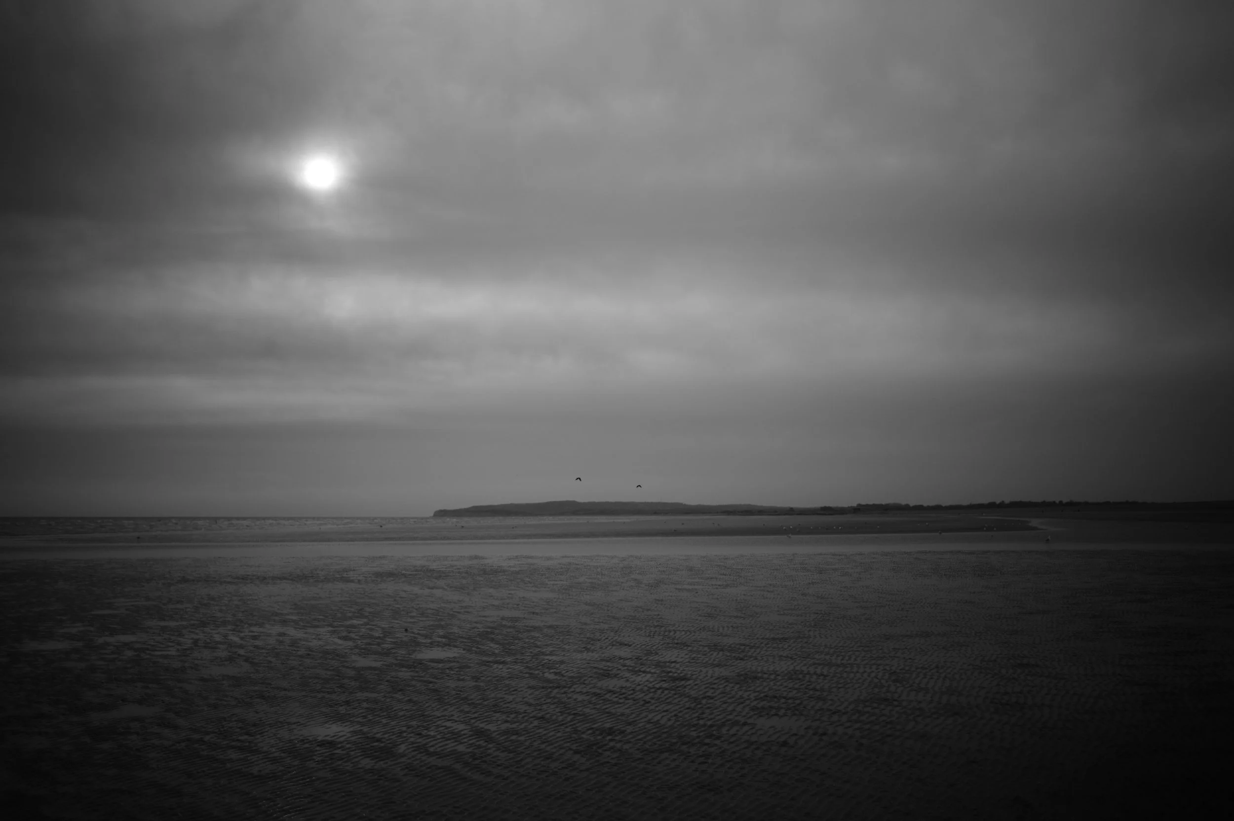 To walk, a quiet beach. To feel and to be. The wanderer, with hands held, the quiet love that needs no words.