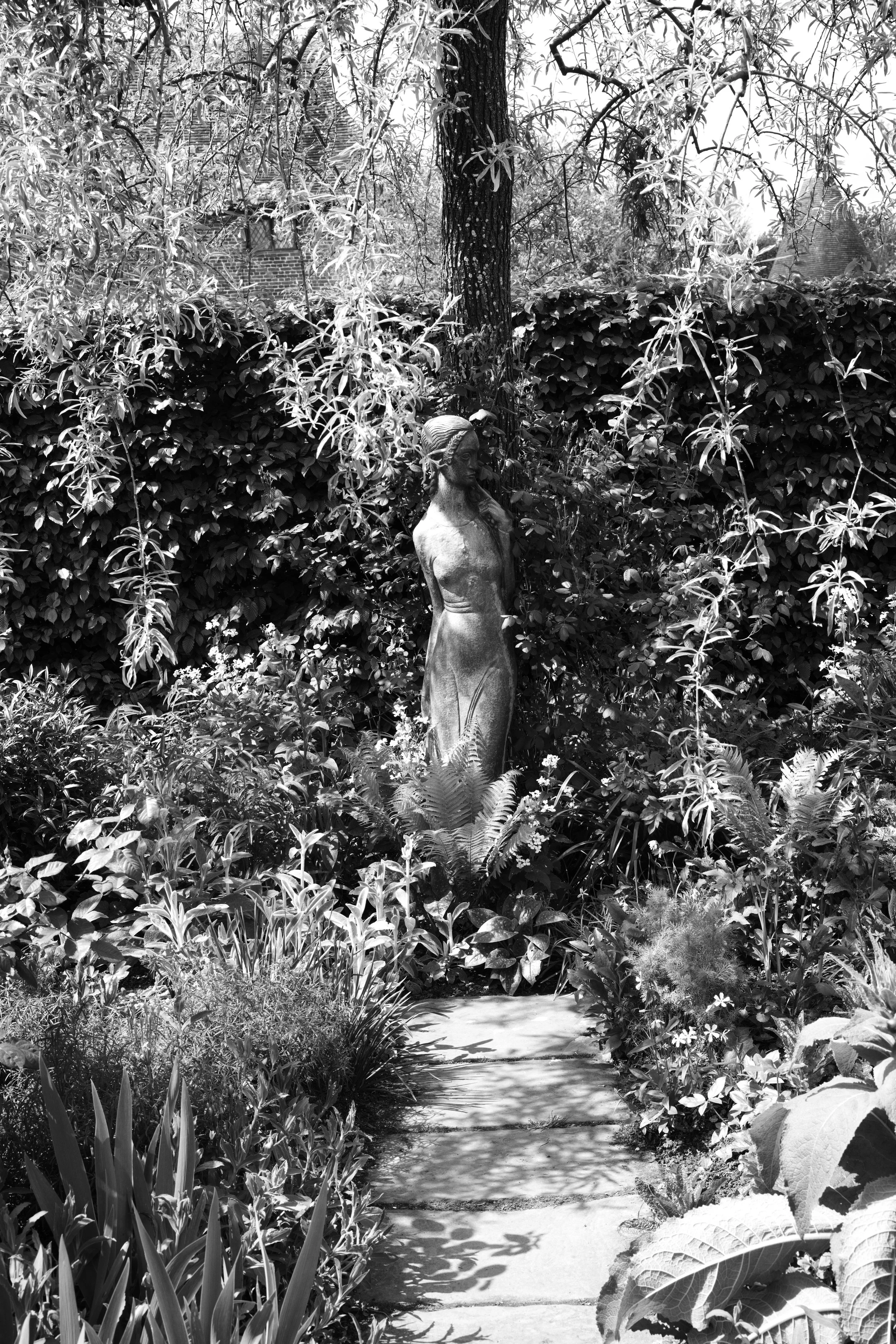 She waits for moonlights kiss, to bring back life to hearts of stone