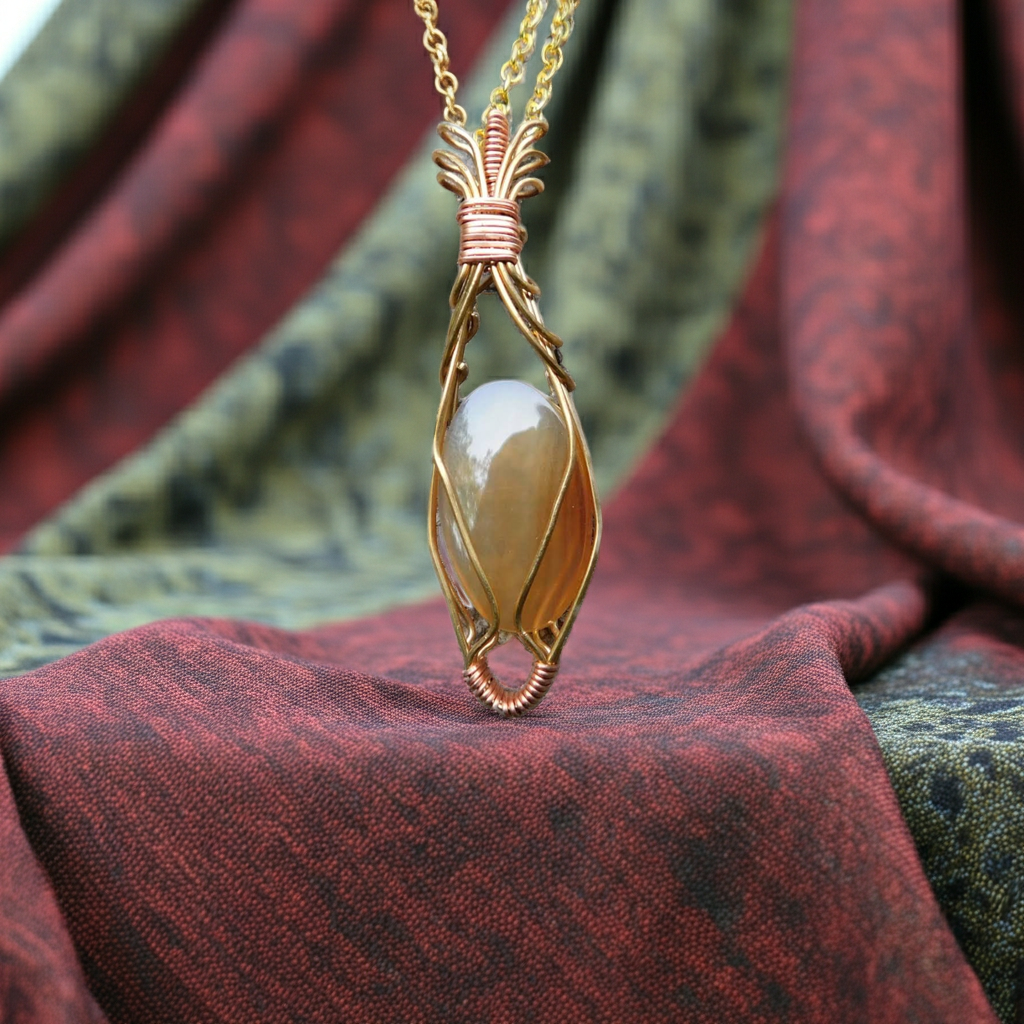 Fire-Agate-Necklace---Wire-Wrapped-in-Gold-and-Copper---Root-Chakra,-Sacral-Chakra,-Solar-Plexus-—-The-Beauty-Way-edited_2.png