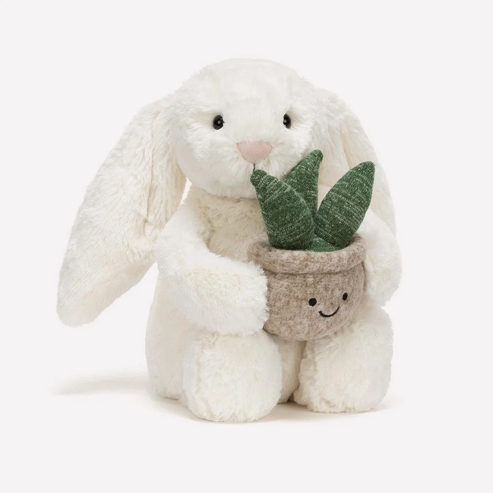 Cream Bunny With Plant by Jellycat, Front Side View.