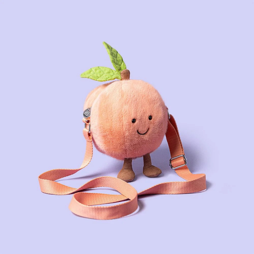 Amuseables Peach Shoulder Bag by Jellycat, Detail View.