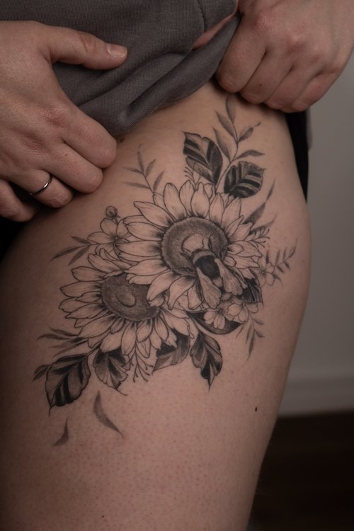 Floral sunflower tattoo by Anne