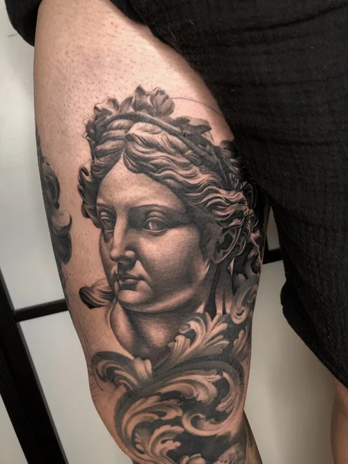 Black and grey realism tattoo by Claudia Santos