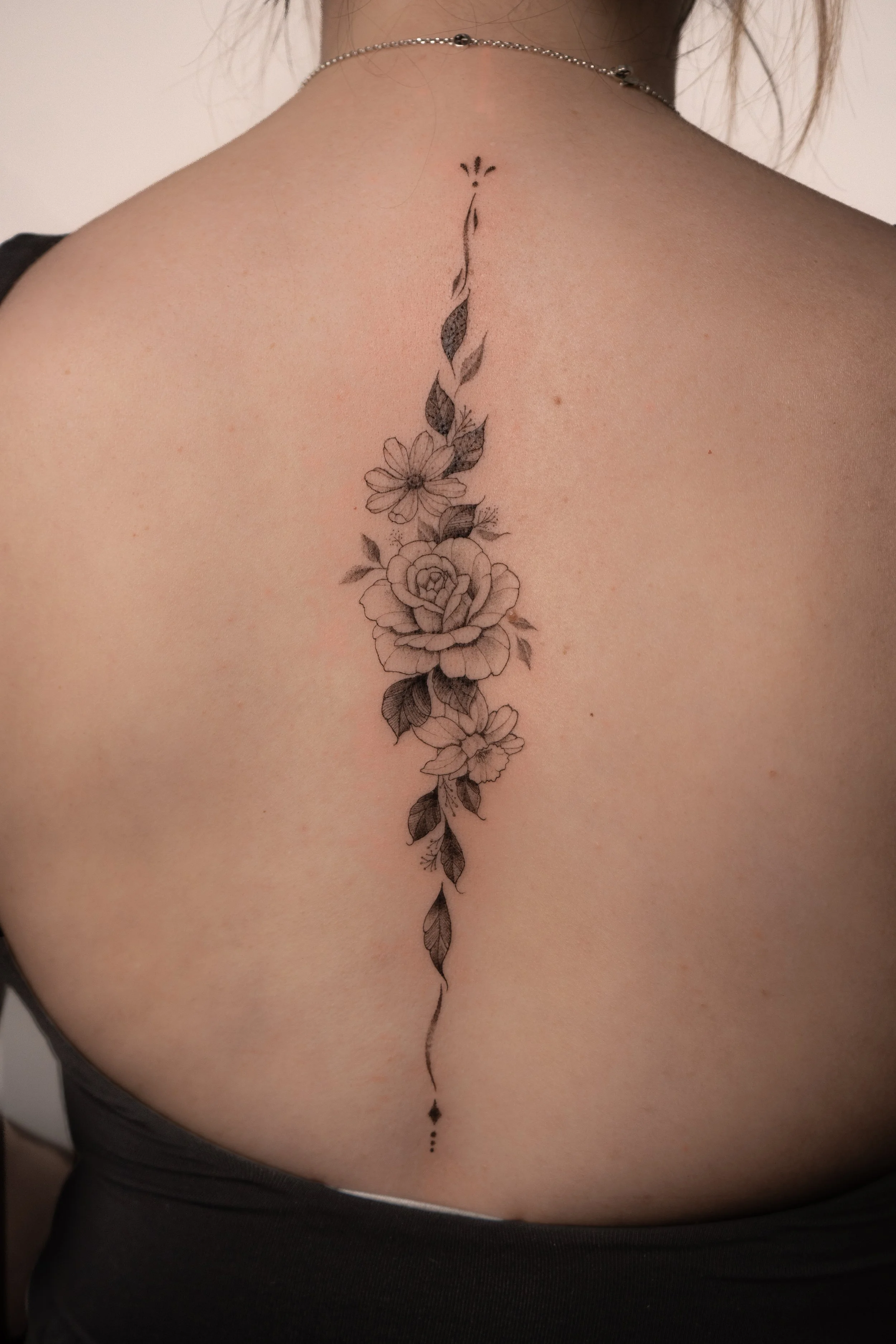 Floral_spine_tattoo.jpg