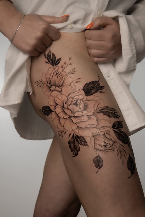 Floral peony tattoo by Anne