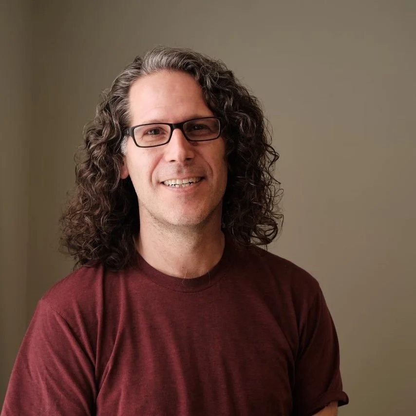 headshot of J Brown Yoga