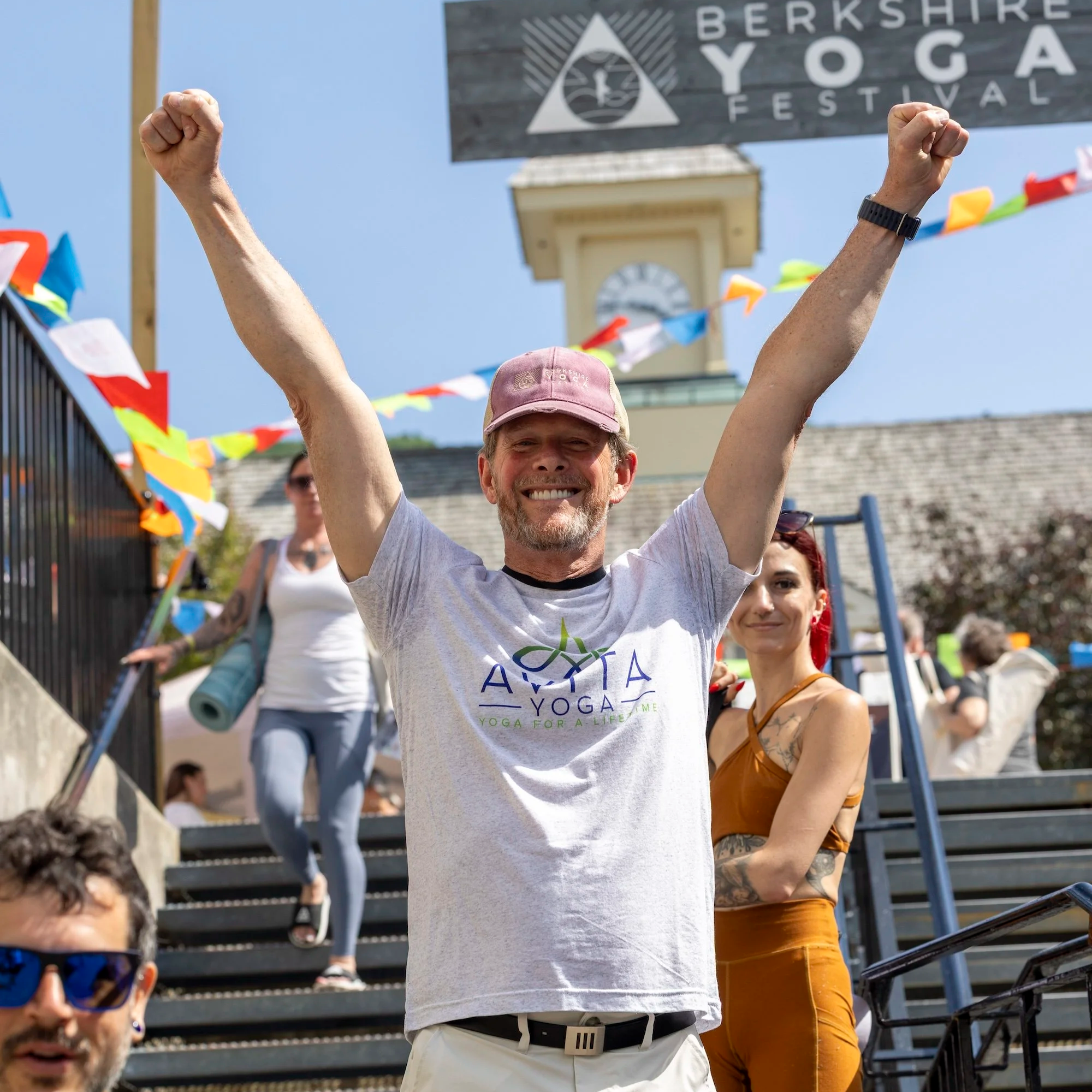 image of Jeff Bailey with arms extended overhead at the Berkshire Yoga Festival