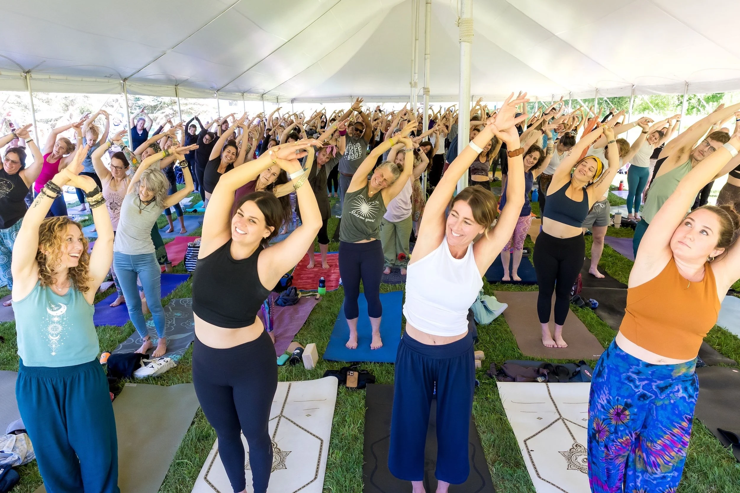 Group yoga class at Berkshire Yoga Festival in Hancock, Massachusetts.