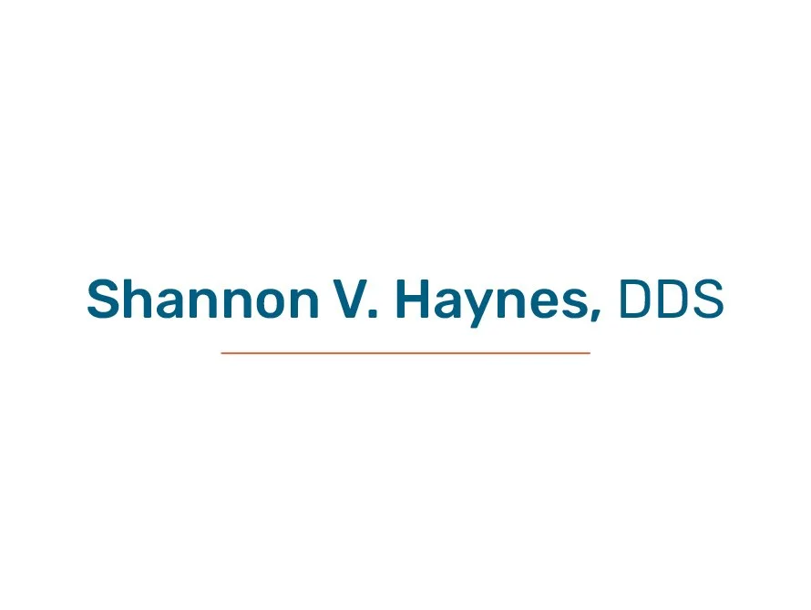 Presentation slide showing the name Shannon V. Haynes, DDS in large blue text with a small brown line underneath, on a white background.
