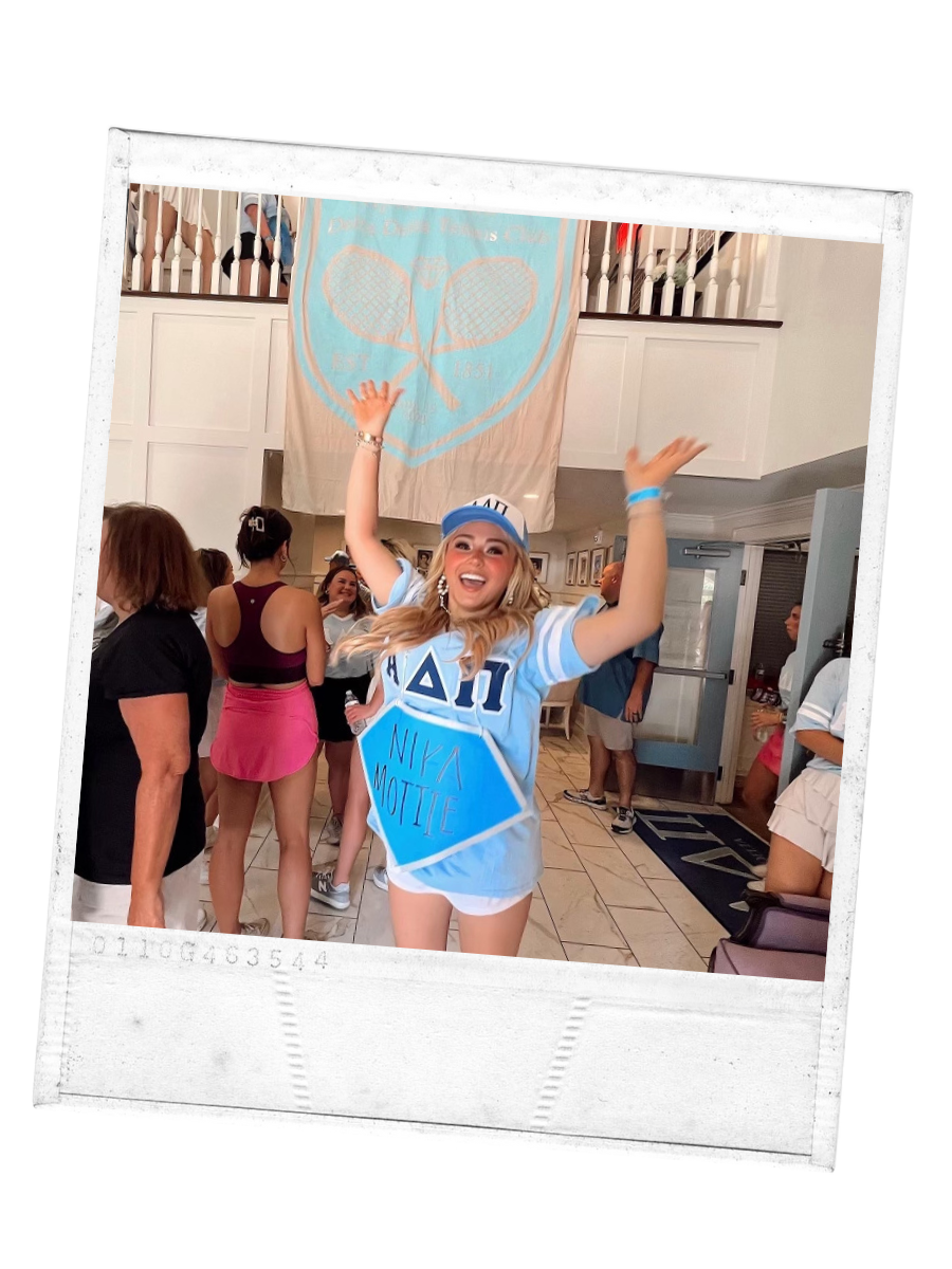 A girl in blue excited on bid day