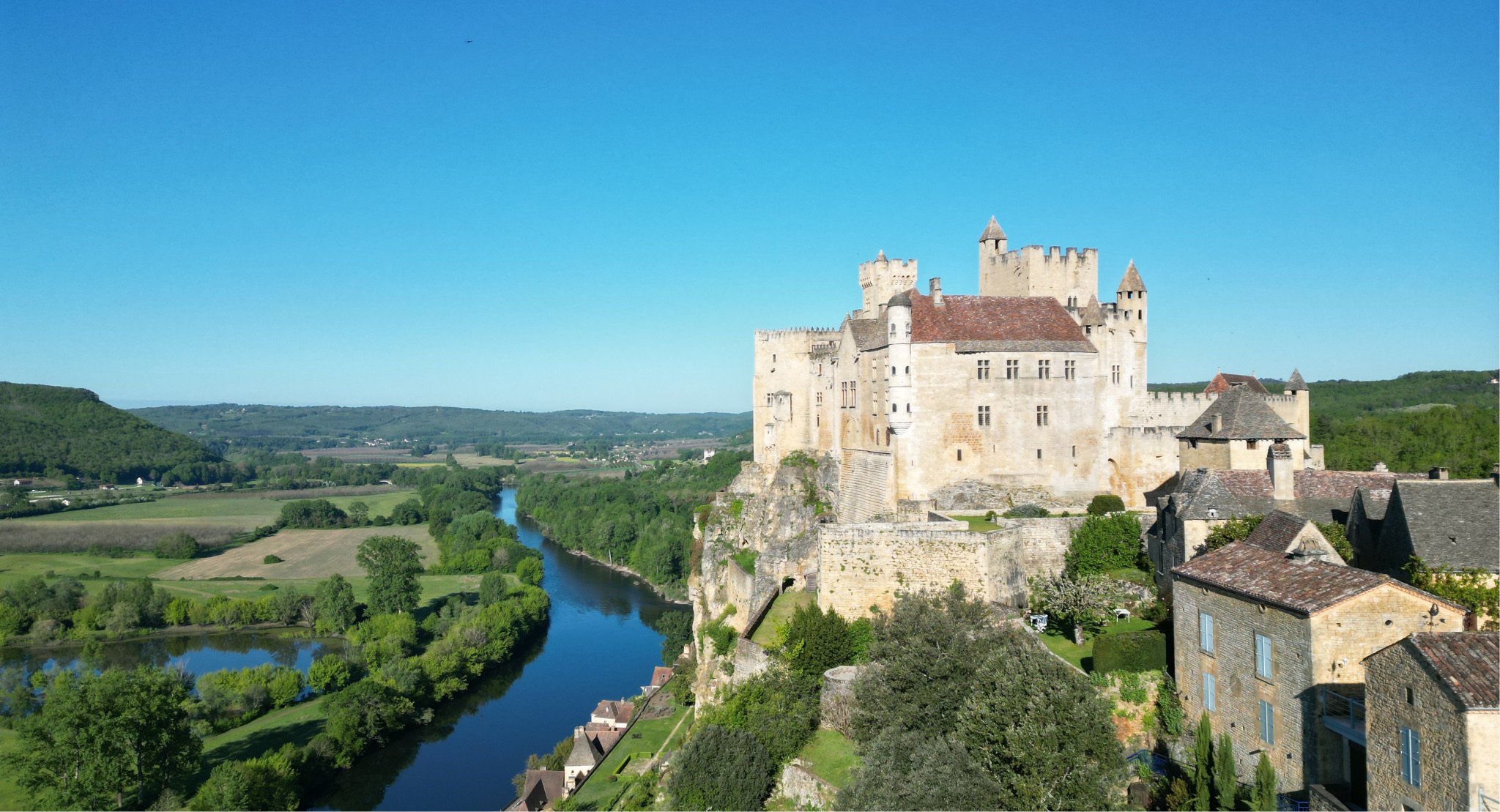   Exploring the 12th-century fortress of Chateau de Beynac overlooking the Dordogne River  