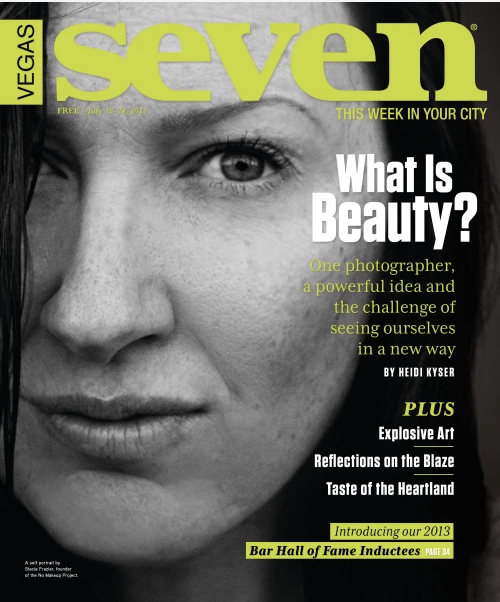 Cover of Seven Vegas magazine featuring a close-up black and white photo of a woman's face, with text about beauty, art, reflections, and a hall of fame induction.