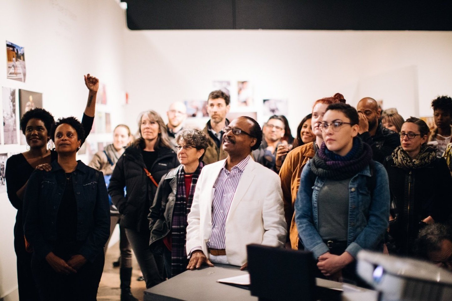  Crowd of people in an art gallery 