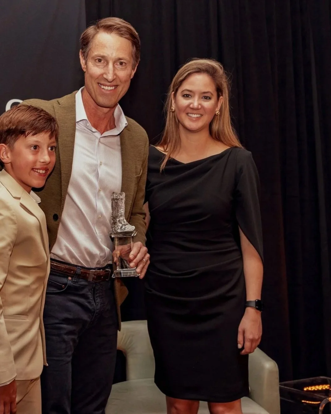 Clayton Christopher Accepting Texas Investor of the Year With His Son