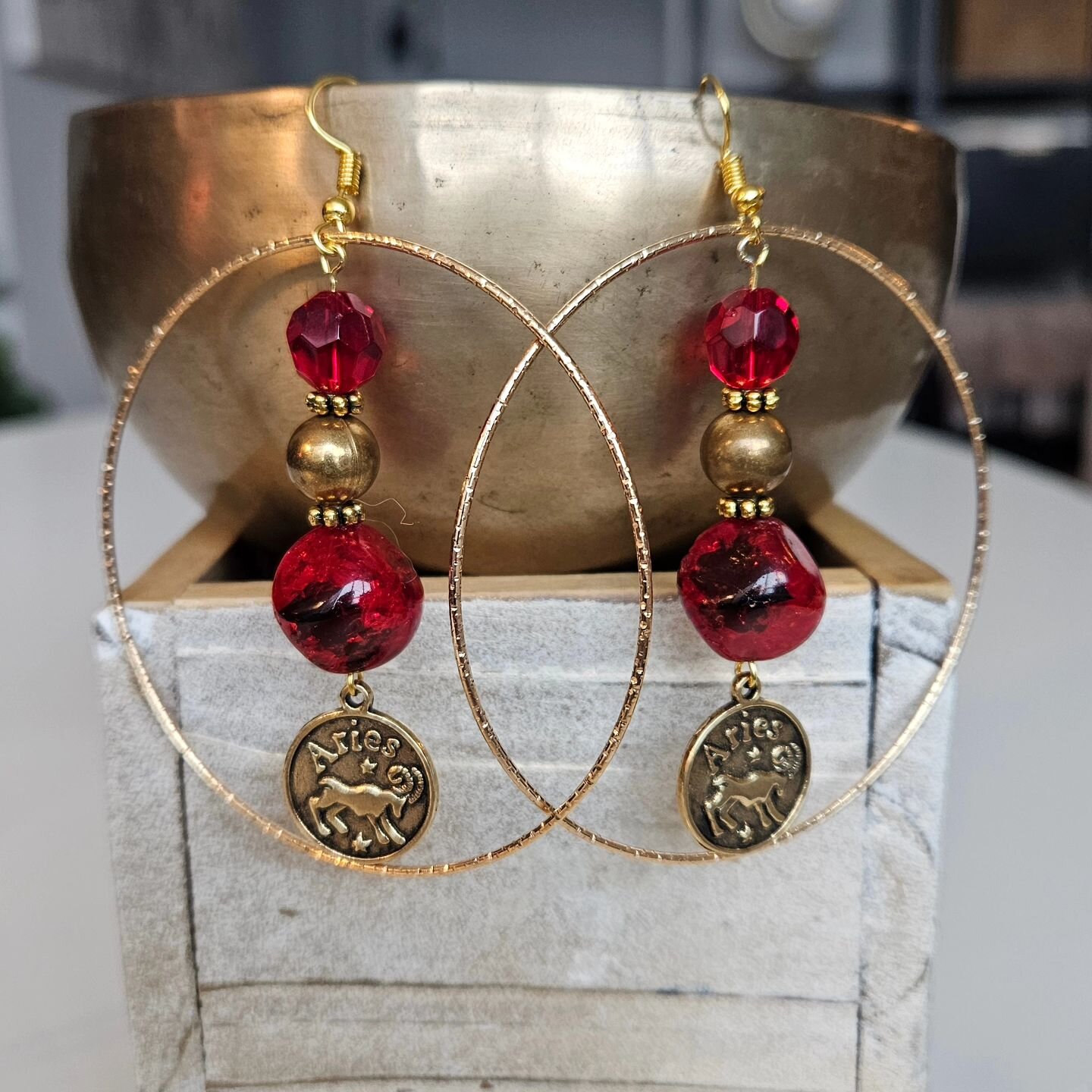 ♈️ Aries ~ &quot;Courageous&quot; ~ Gold

Now these are statement earrings!  Gold bangles make the hoops.  Black and gold marble beads, gold sphere, red beveled crystal at the top divided by studded gold beads.  These exude courage! 

🌌 Take things 