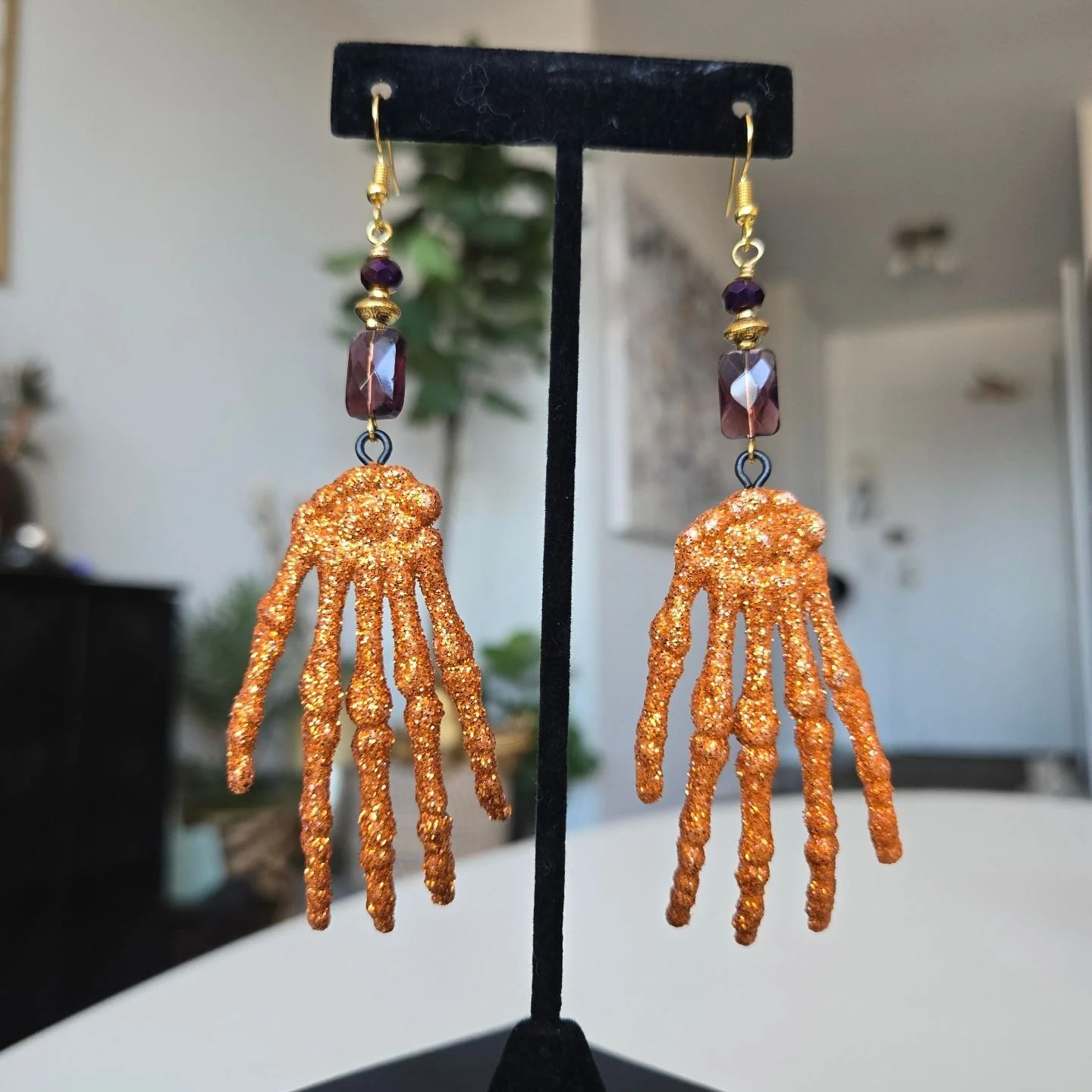 Purple + Orange Glitter Skelton Hands 
Are these not the coolest!?