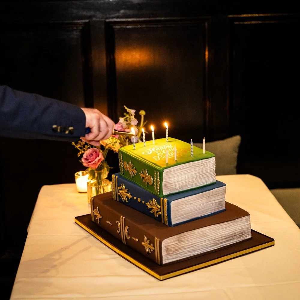Check out this incredible #cake from @sindesserts for Jim's 80th birthday at the #providenceartclub #pvd #isitcake #birthdaycake #books #literary #providencephotographer