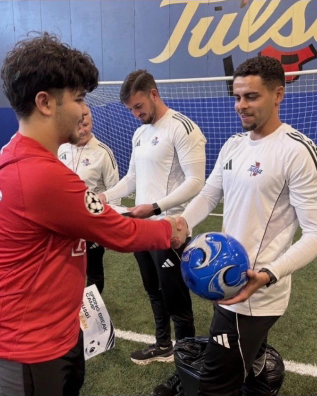 Our Refugee Youth Mentorship Program hosted a soccer camp with Tulsa Athletic Soccer Foundation and @utulsa! Big thank you to the TU men's soccer team coaches for leading the training! ⚽