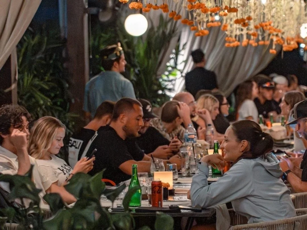 group diners dining at rooftop restaurant in ubud