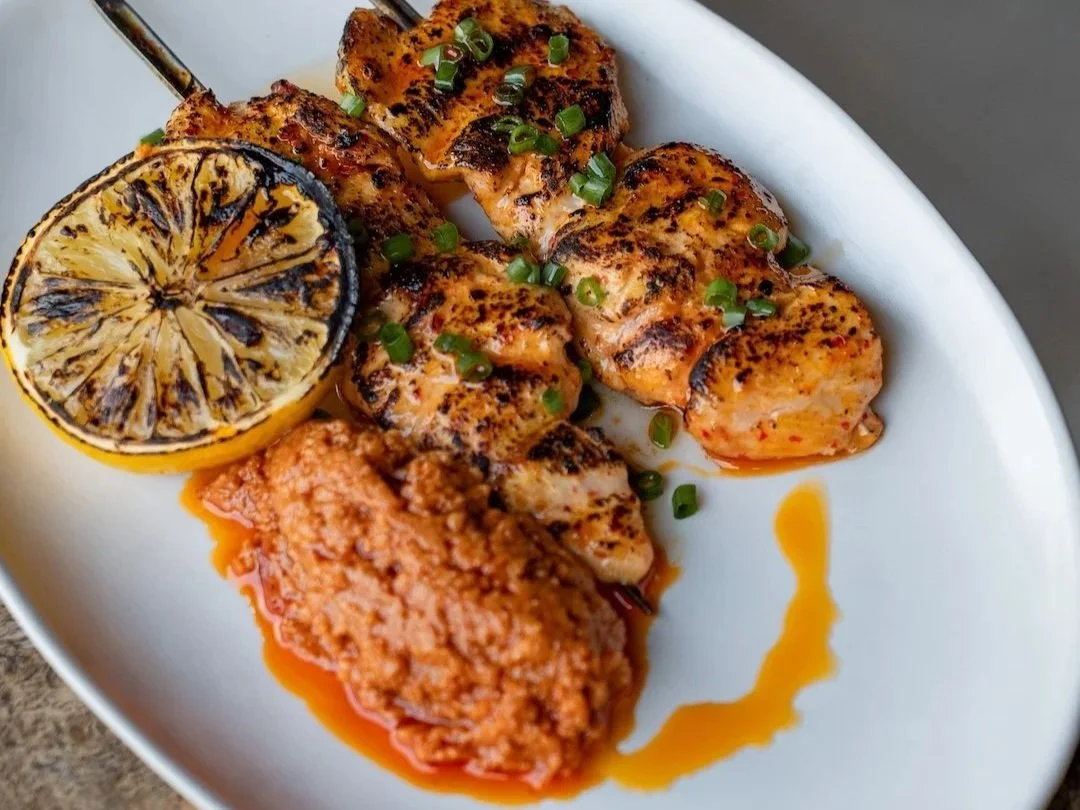 grilled chicken skewers with torched lemon