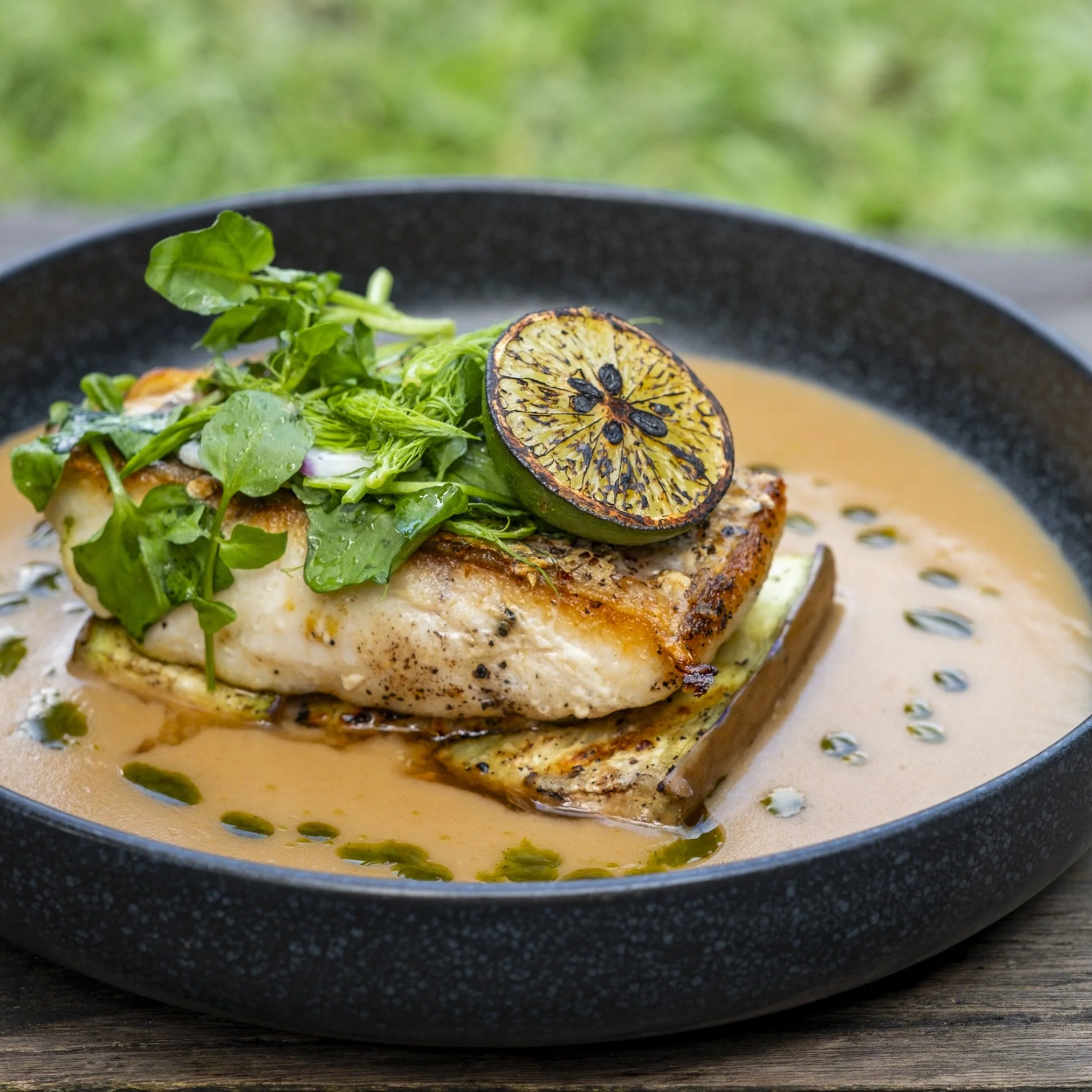 miso soy glazed salmon with torched lemon and vegetables