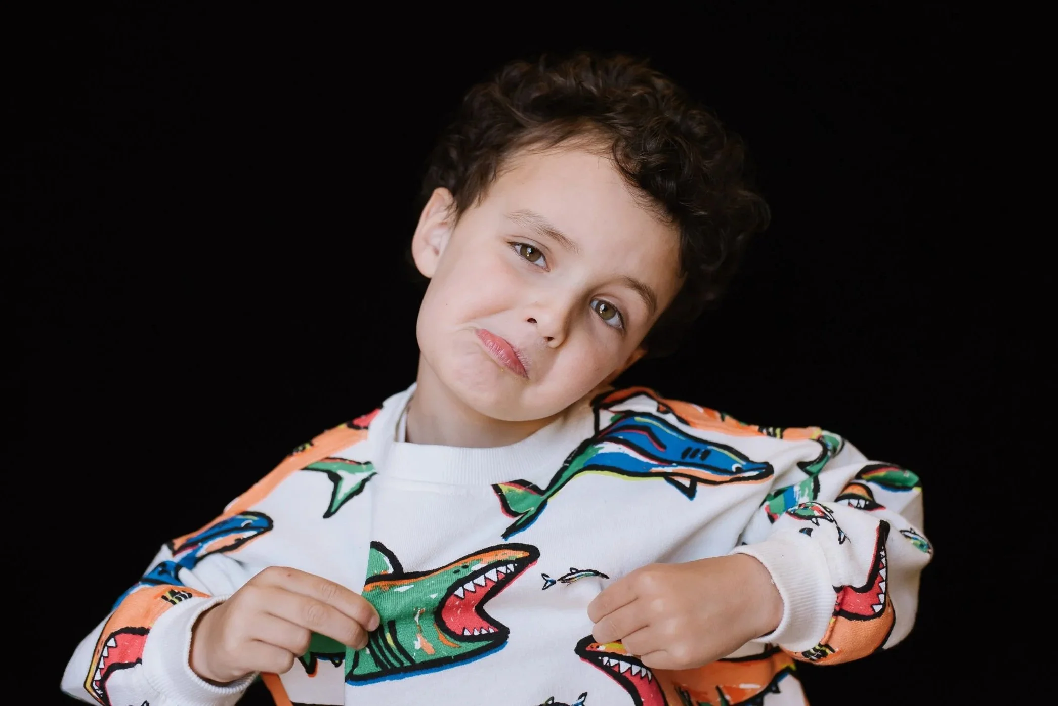 Preschool school portrait of a boy with a silly expression