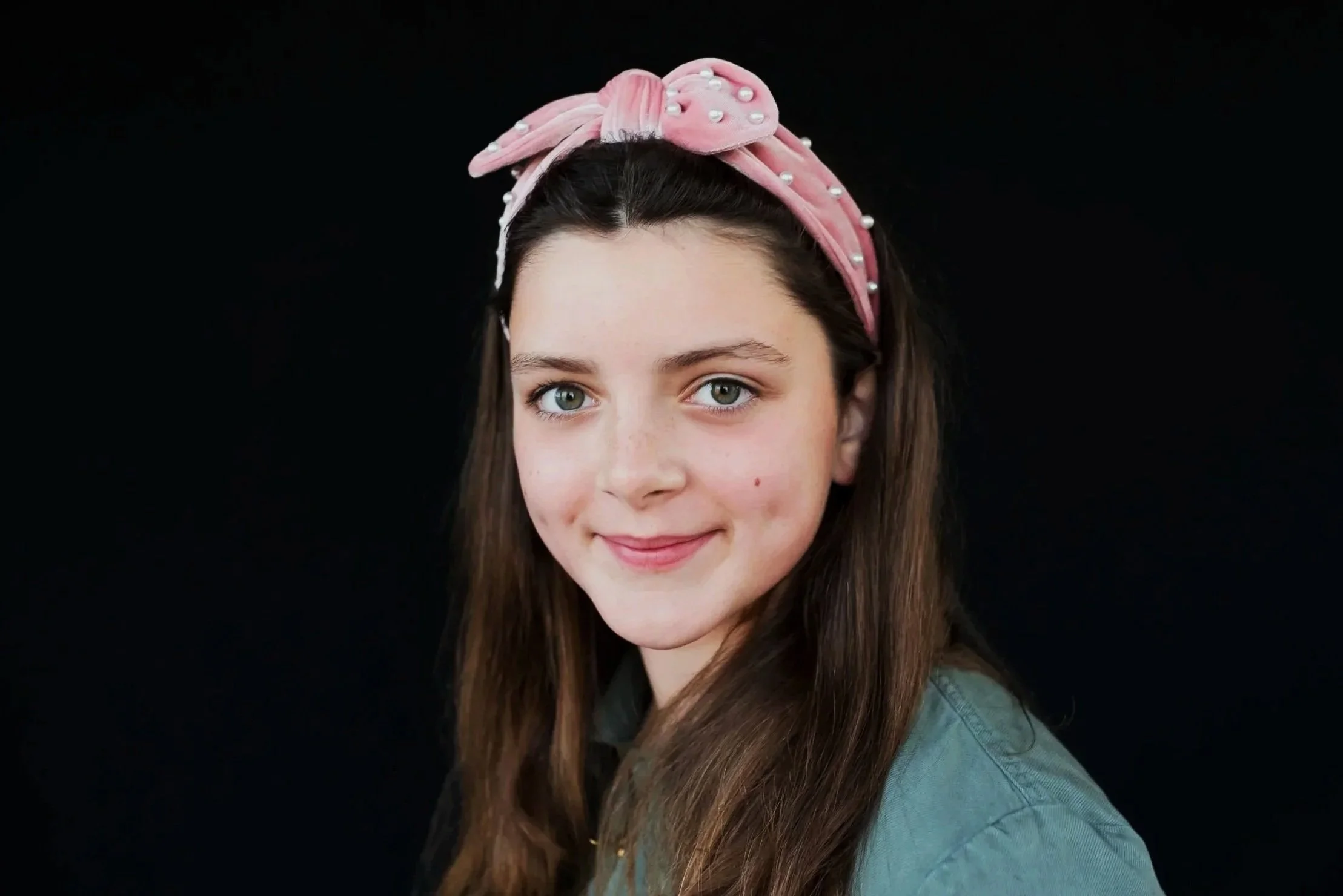 School portrait of girl in middle school smiling 