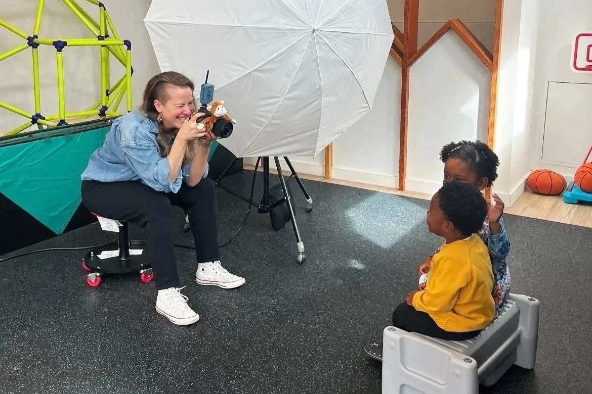 School photographer interacting with preschool children during Picture Day