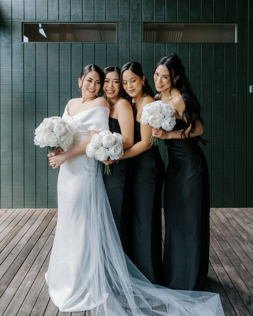 Our sweet and beautiful Marion breathtaking in JESS gown by @evalendel with her bride squad by her side&mdash; absolutely nailing the the monochrome chic vibe 🤍🖤

📷 by @yourstory.images